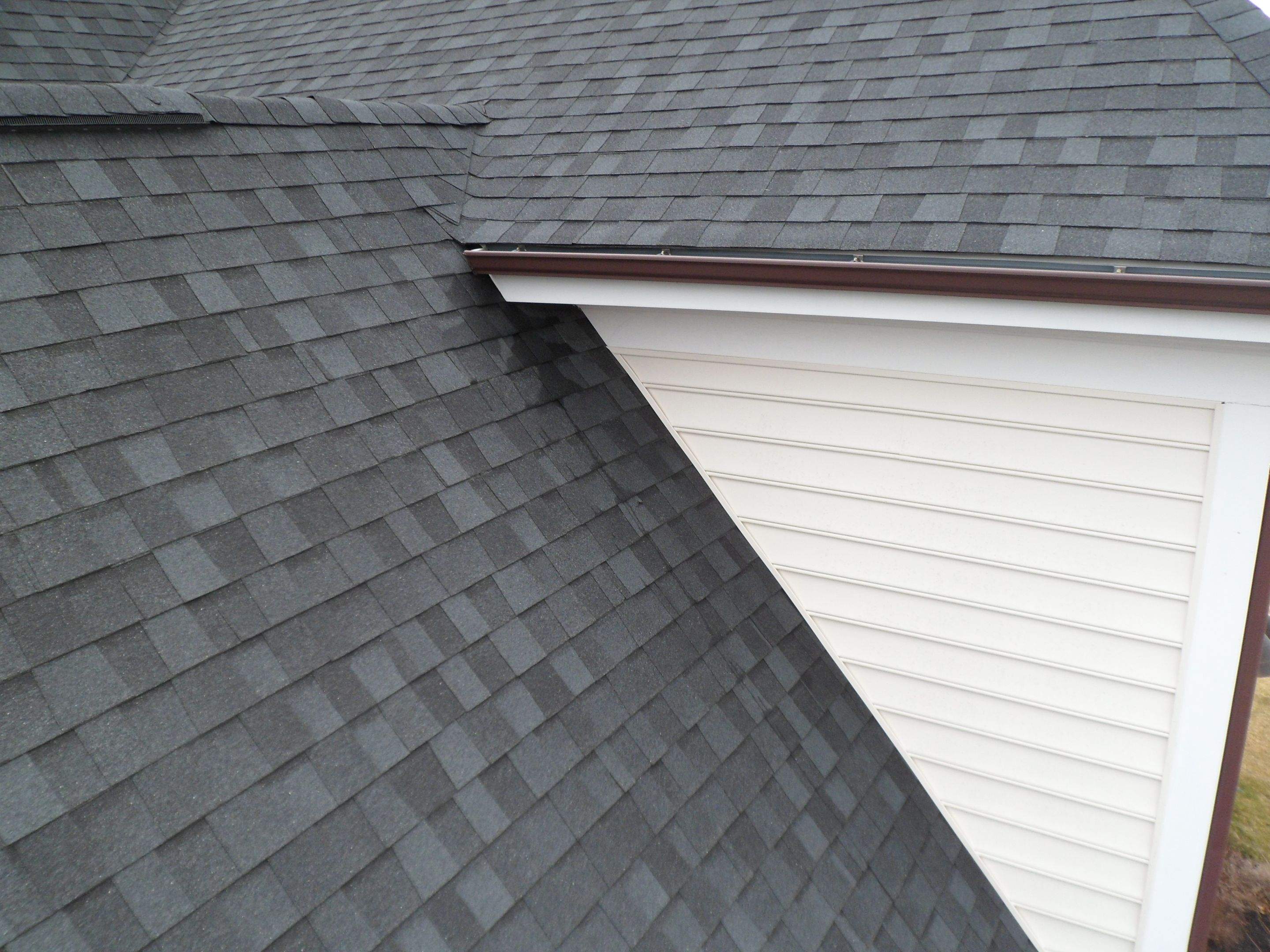 Residential Roofing Repair using Vulkem Black Caulk  by Alpha Design Services
