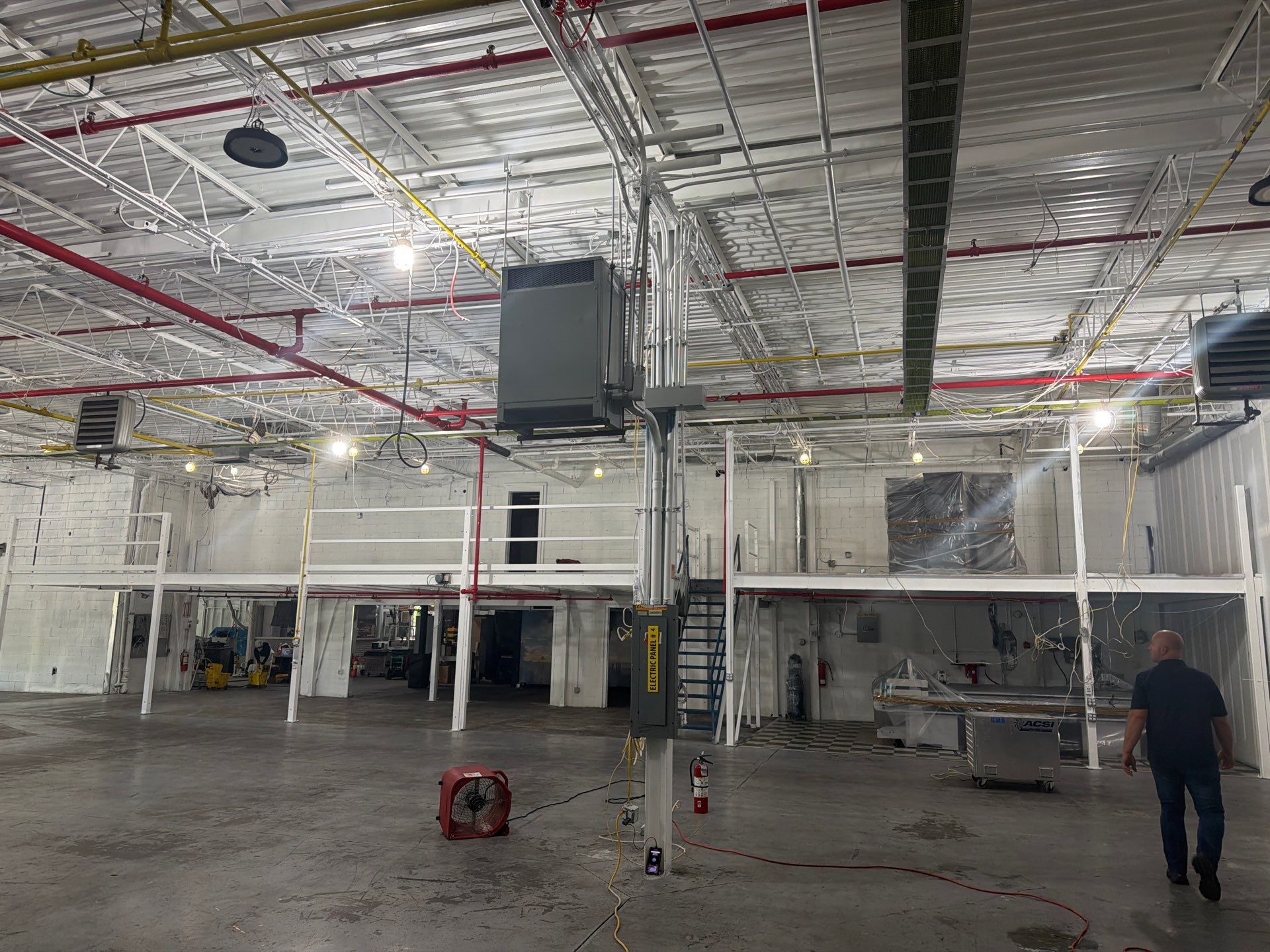 Industrial Warehouse Fire Damage Cleaning and Spray Sealing in Islandia by EMS Restoration Corp