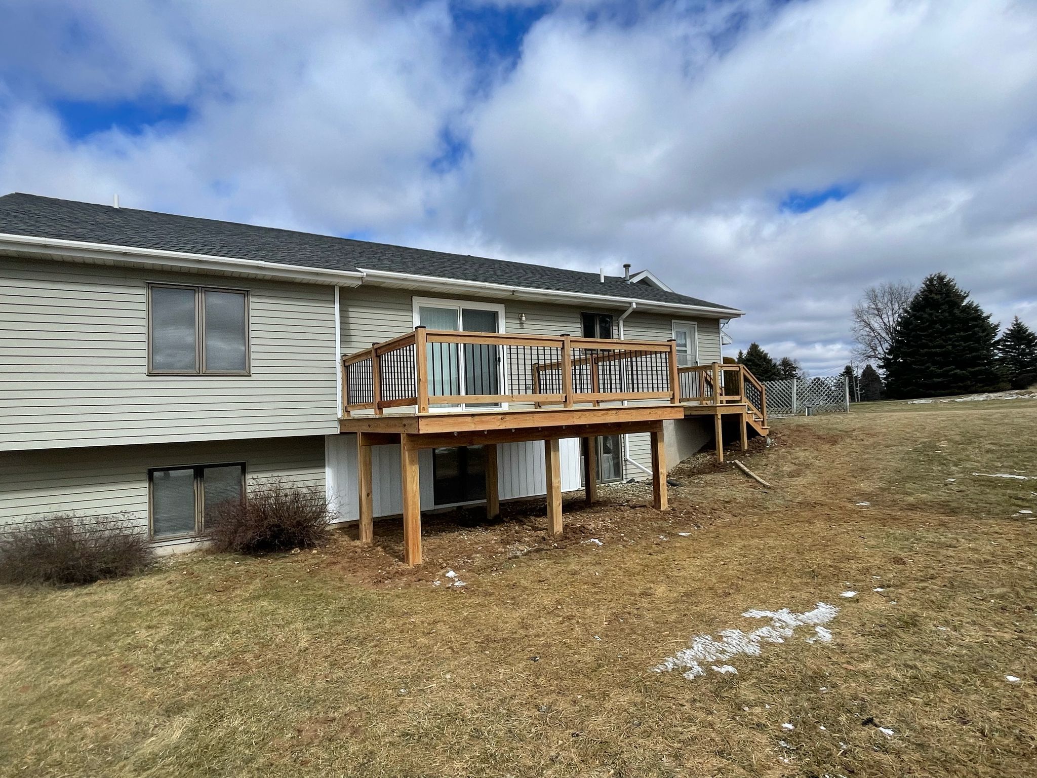 Deck Installation using Treated Lumber by Avalon Roofing and Exteriors