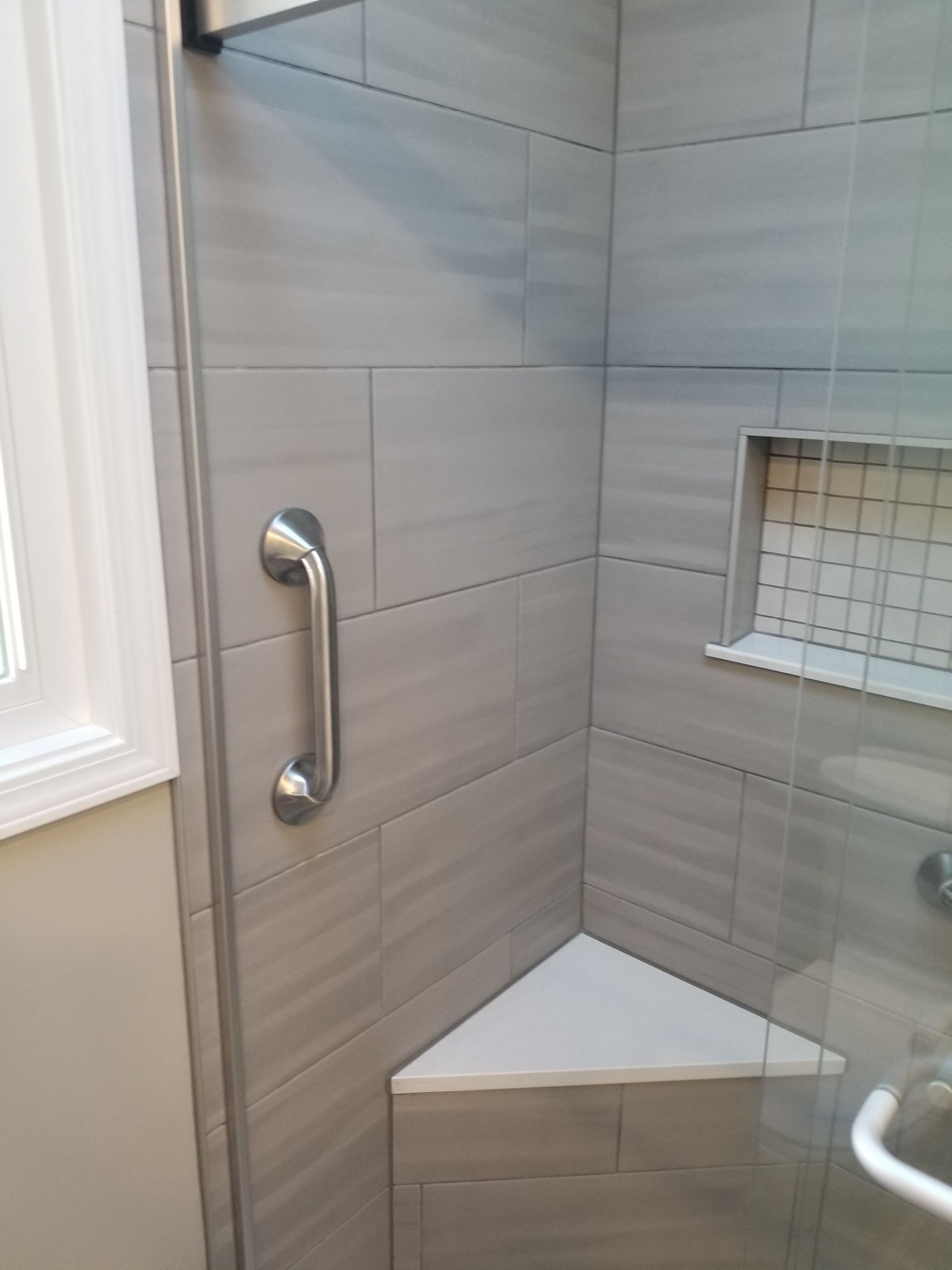 Remodel full bathroom new tile walk in shower plus 2nd half bath Powder room in Livonia, MI by Northwest Construction