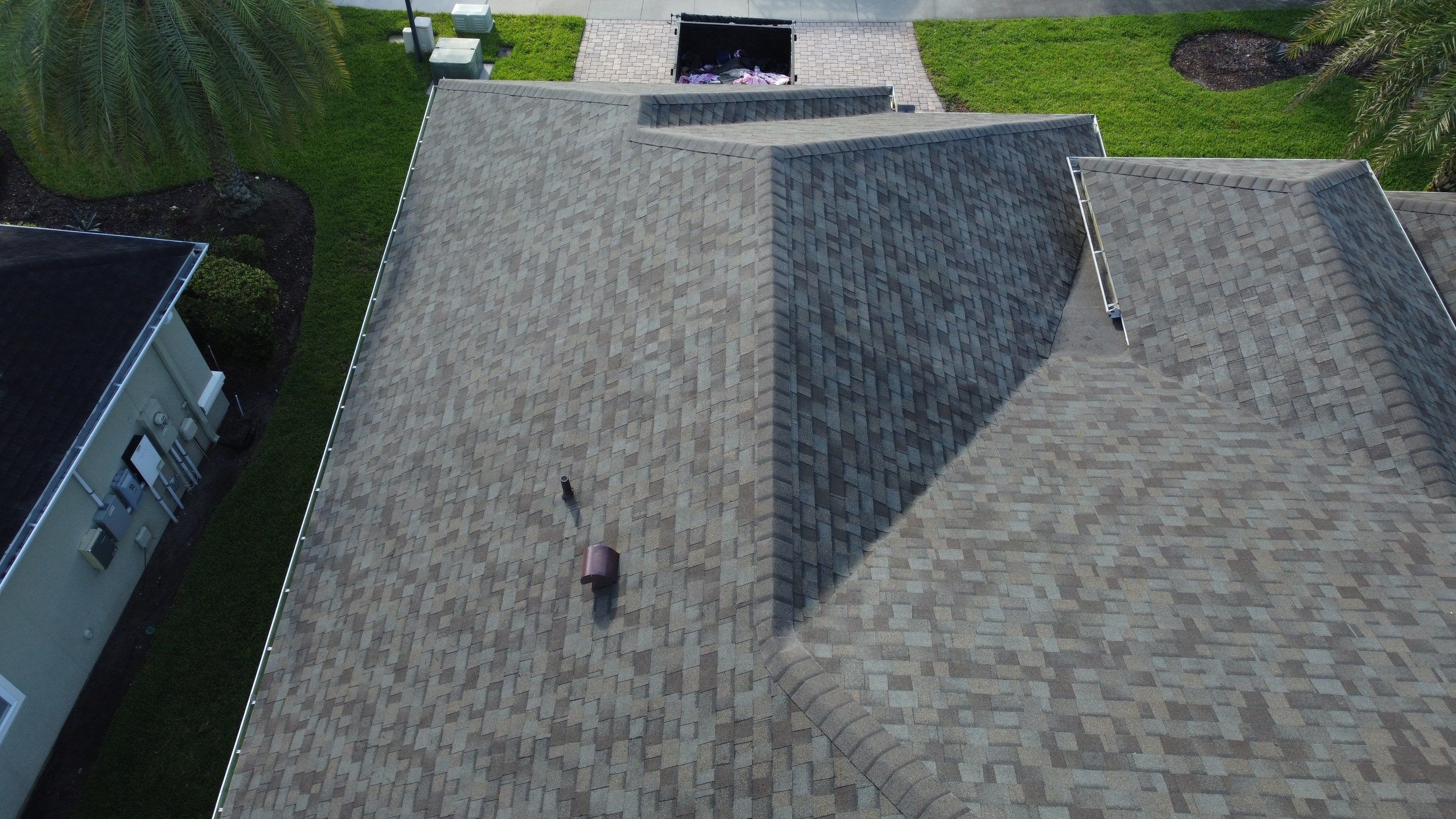 Ponte Vedra Residential Roof Replacement with Driftwood Architectural Asphalt Shingles by Trinity Restoration and Roofing LLC