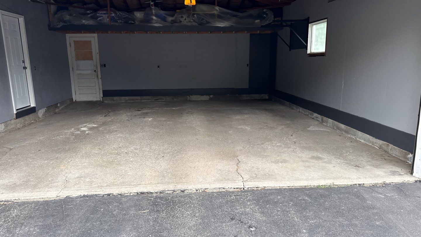 Concrete garage floor replacement and epoxy coating installed  by NG Masonry & Construction LLC