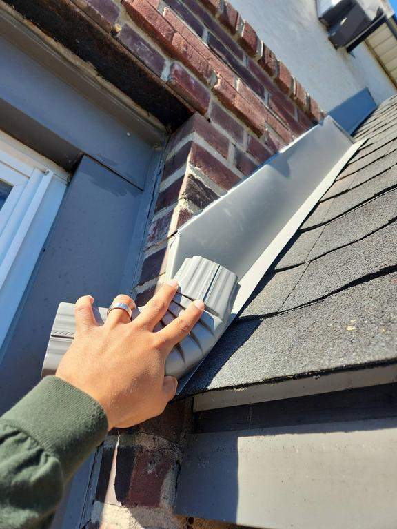 New Roof & Gutters by Island Roofing Inc.