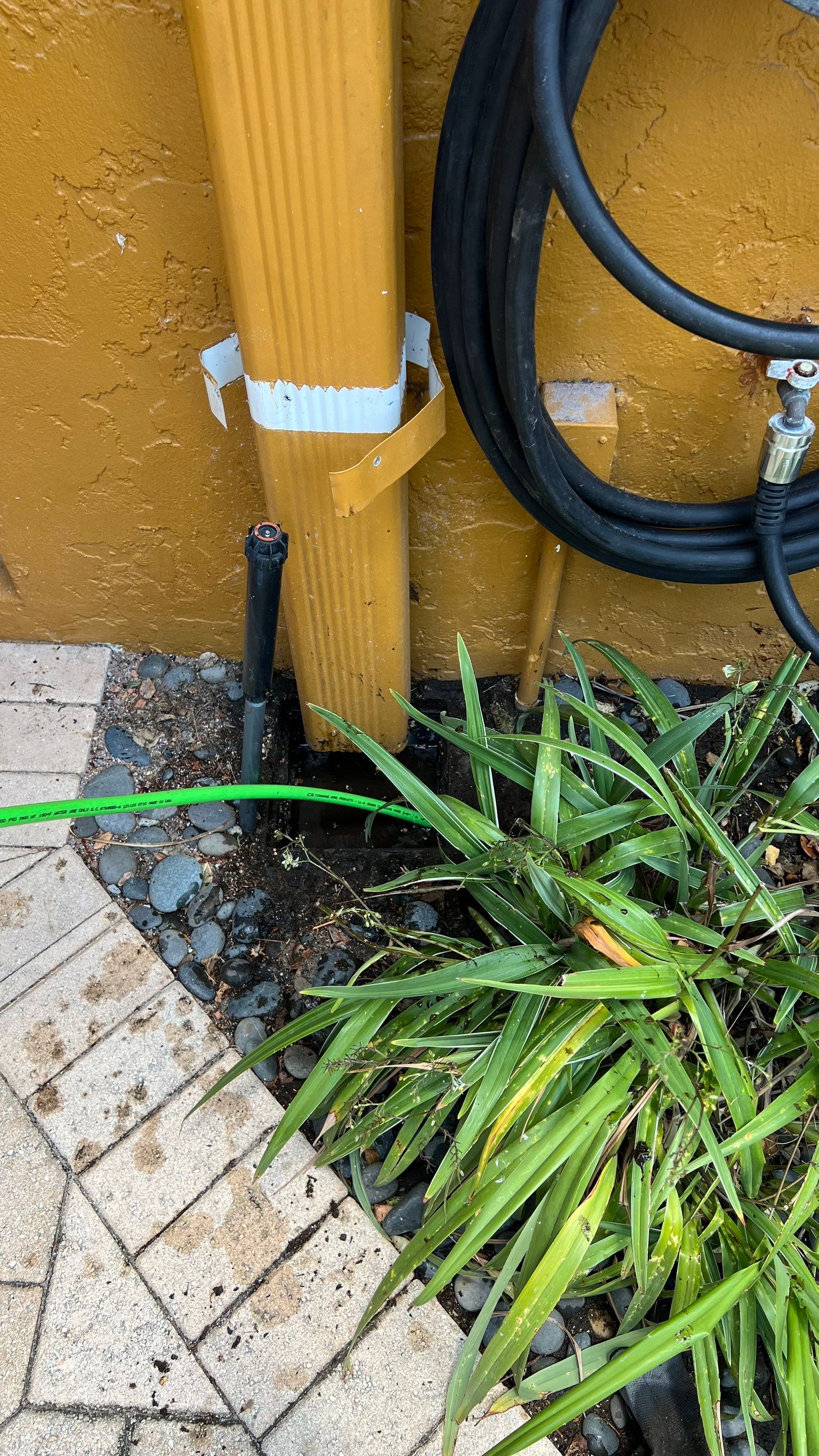Residential Stormwater Gutter Drain System Maintenance by APS Power & Water