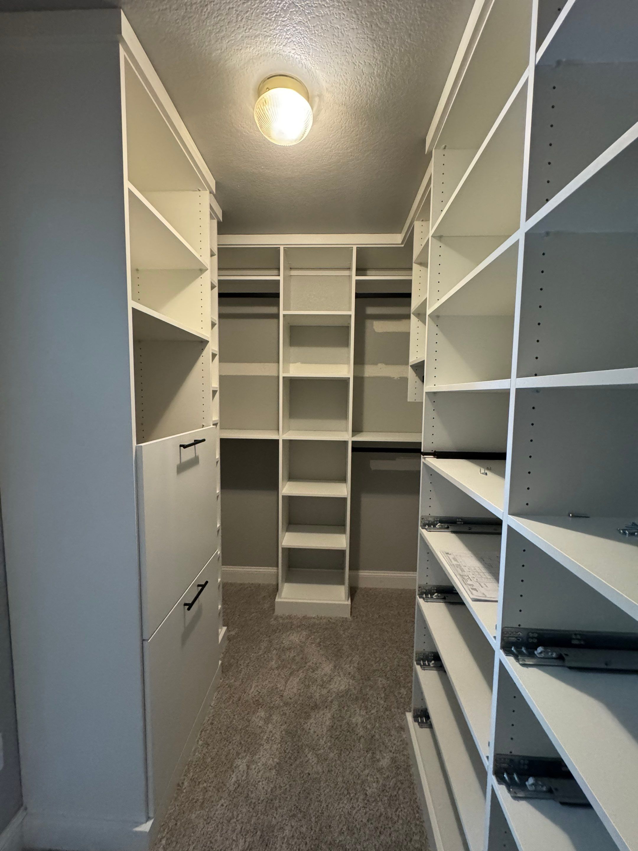 Custom Built-In and Primary Closet in Longmont by Concept 32, Inc.