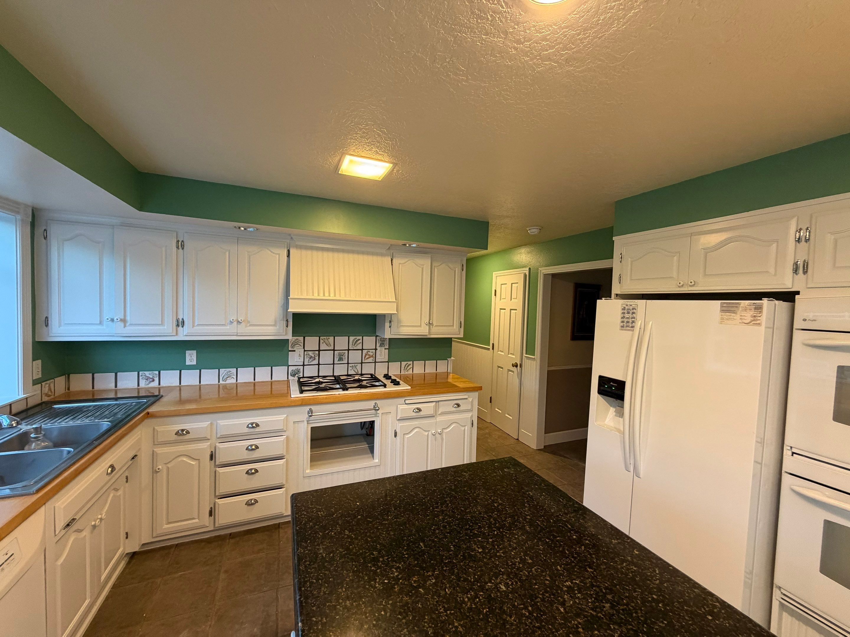 Kitchen Cabinets Painting by Handyman State LLC