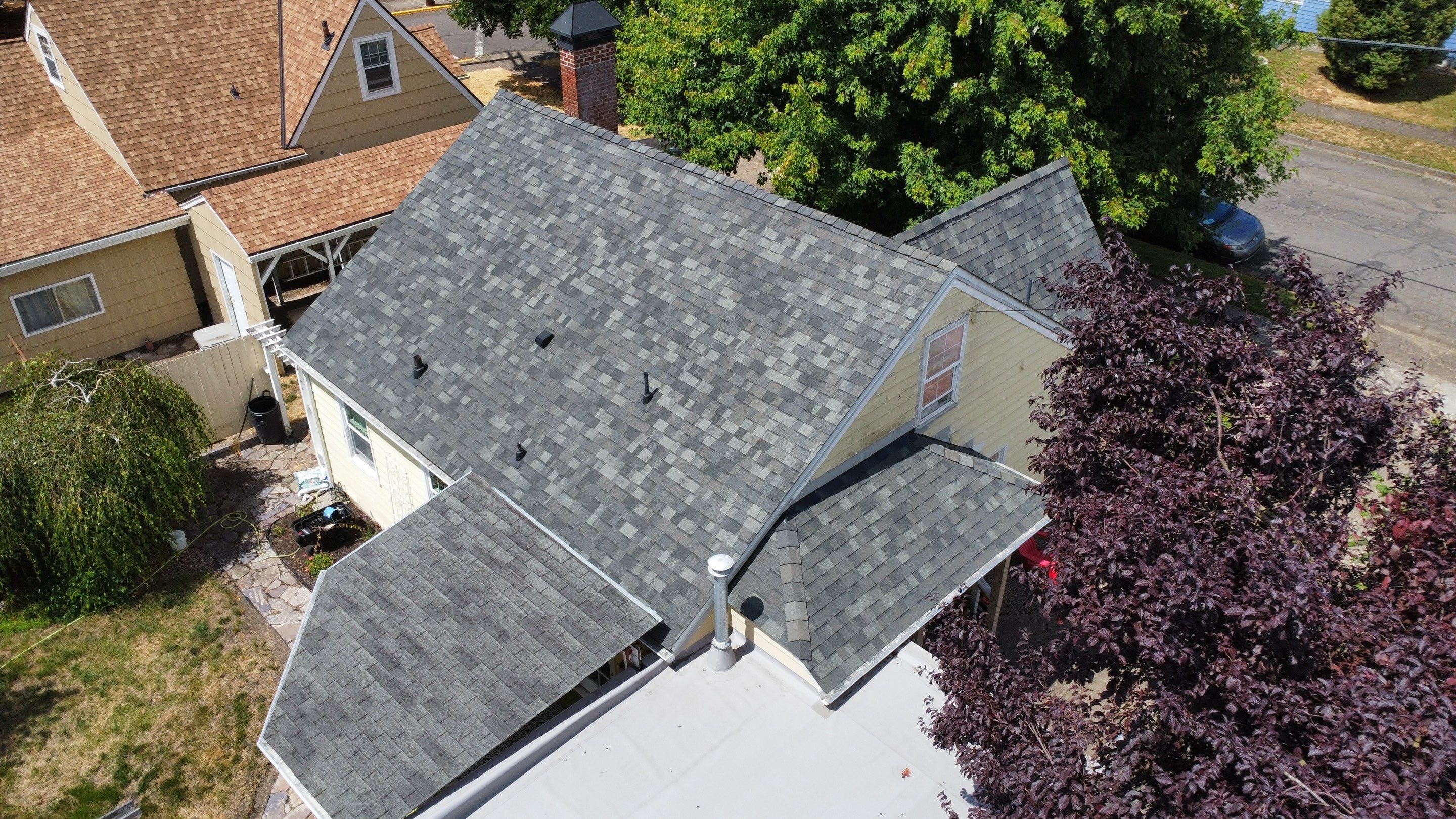 Residential Roof Installation with Added Insulation Barrier  using Malarkey Vista AR Shingles (Color: Storm Grey) by Orezona Building & Roofing Company, Inc.