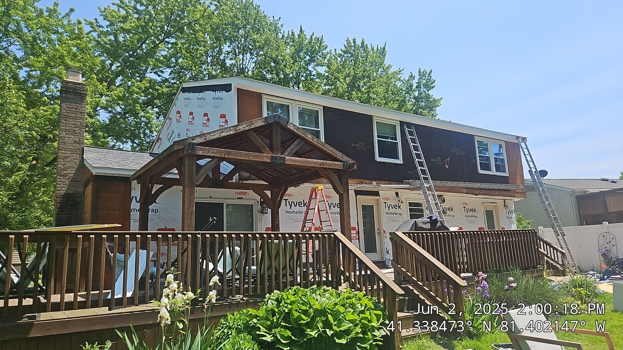 Roof, Siding, & Gutters by Absolute Roofing and Construction