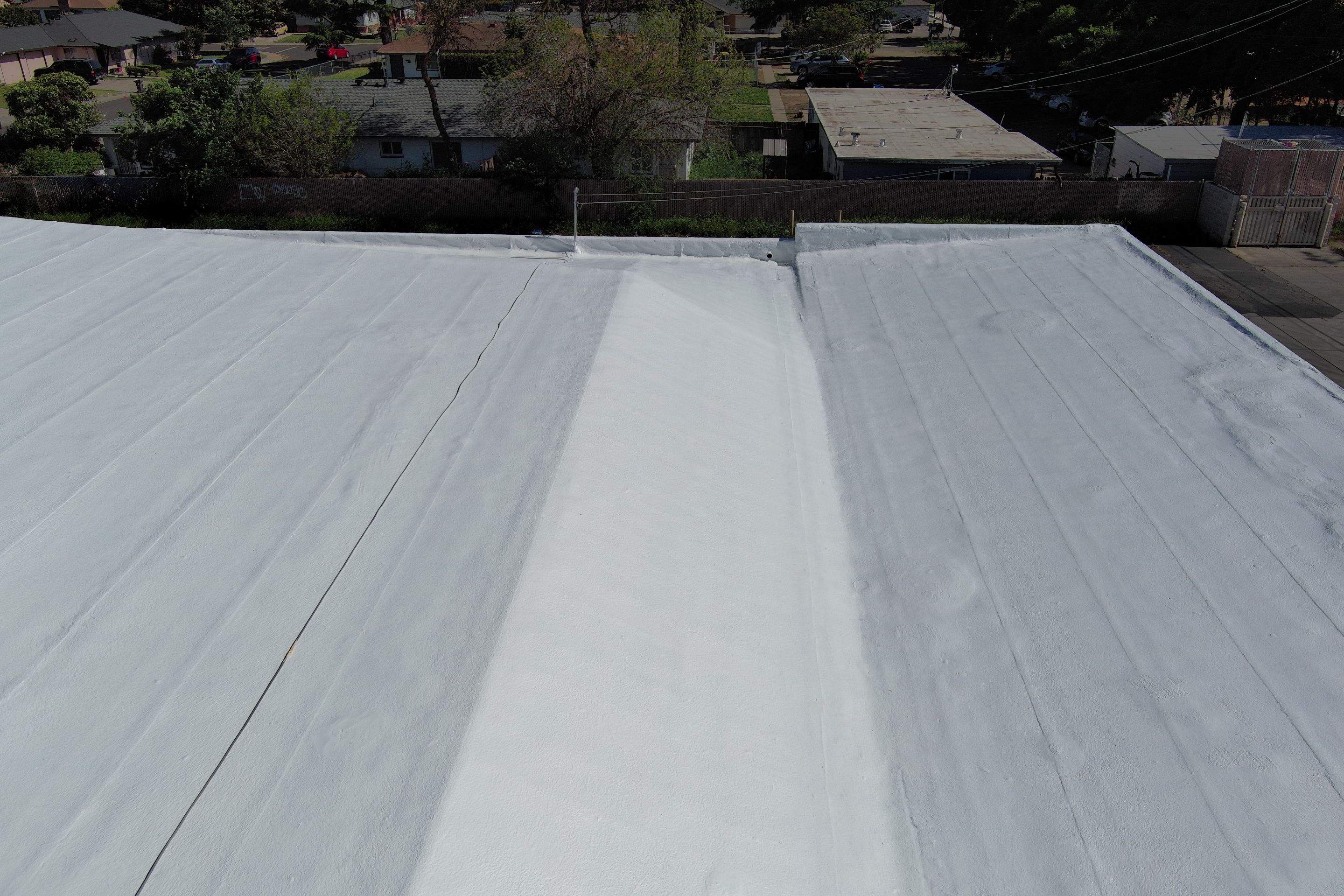 Foam Refurbish using Conklin Benchmark/PUMA XL coatings and spray foam by Straight Edge Roofing Inc