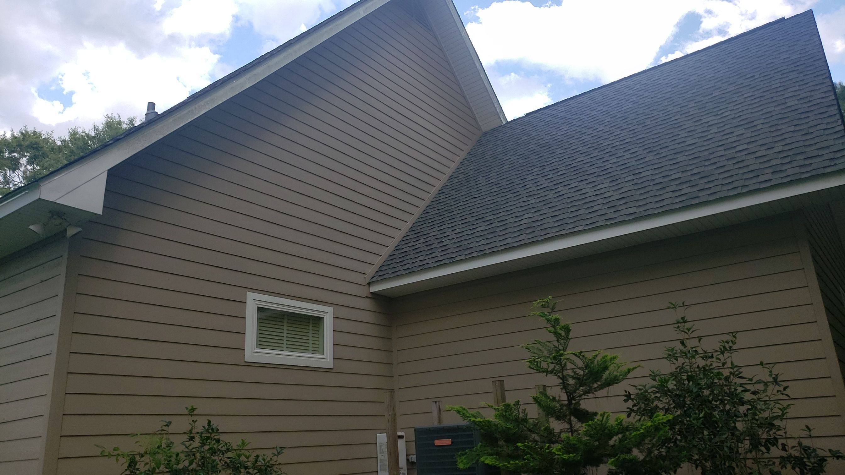 Residential Roofing Installation using Roof Replacement by American Roofing & Construction LLC