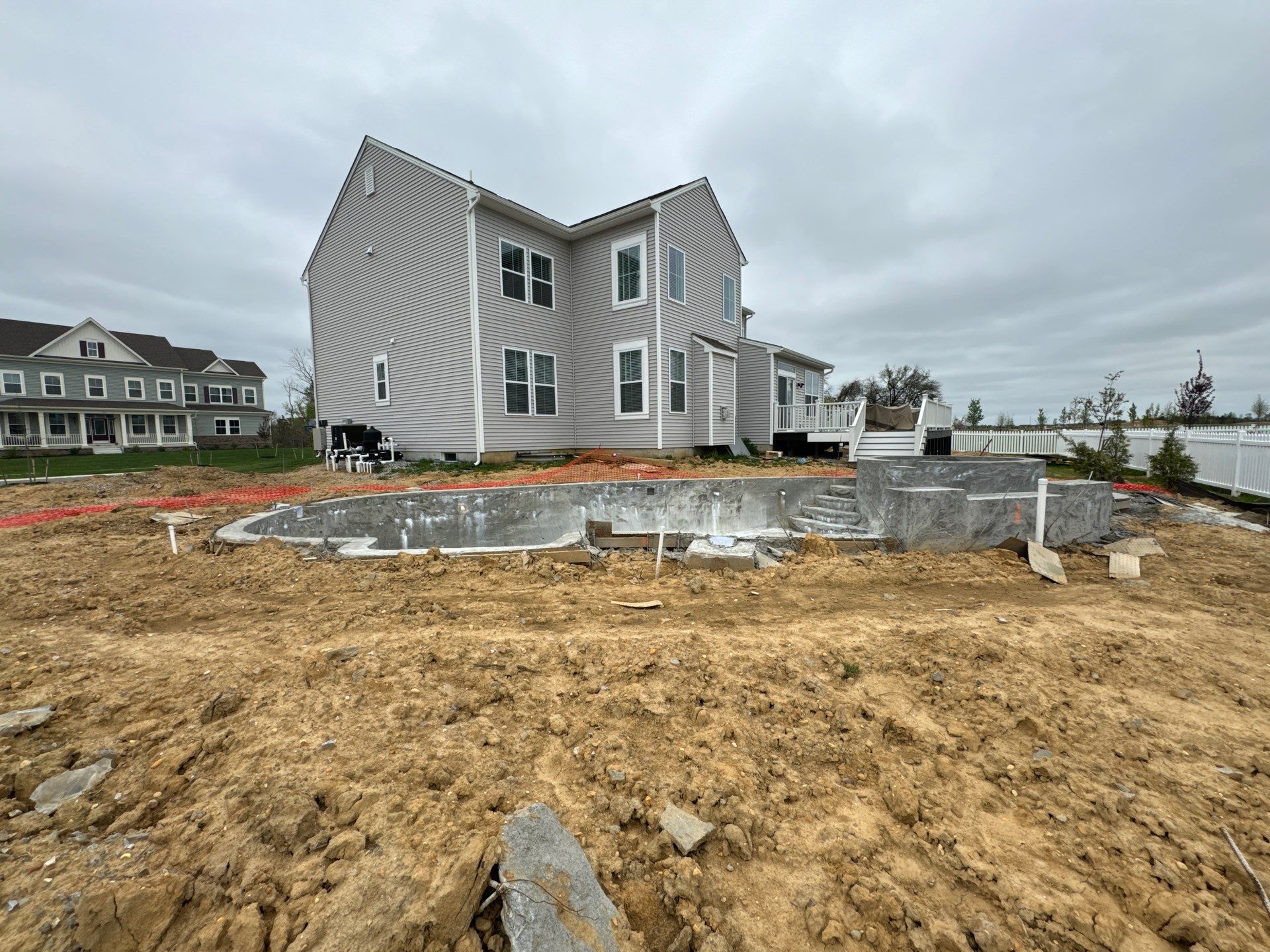Pool and Hardscape Design in Delaware | Belgard Paver Patio & Outdoor Living Space by Studio G Indoor Spaces & Outdoor Living