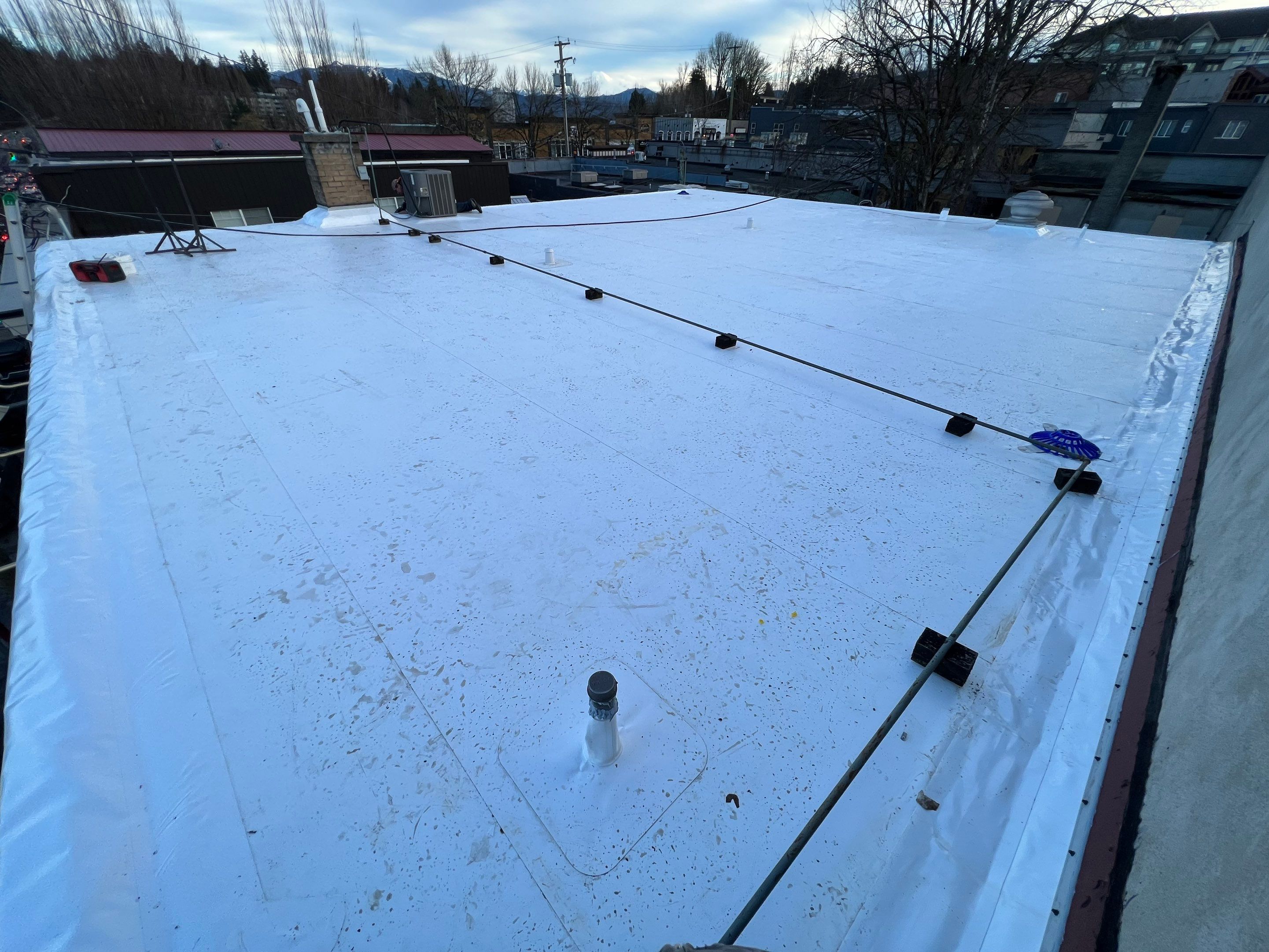 Residential ReRoofing Installation using Durolast by Top Notch Roofing Inc