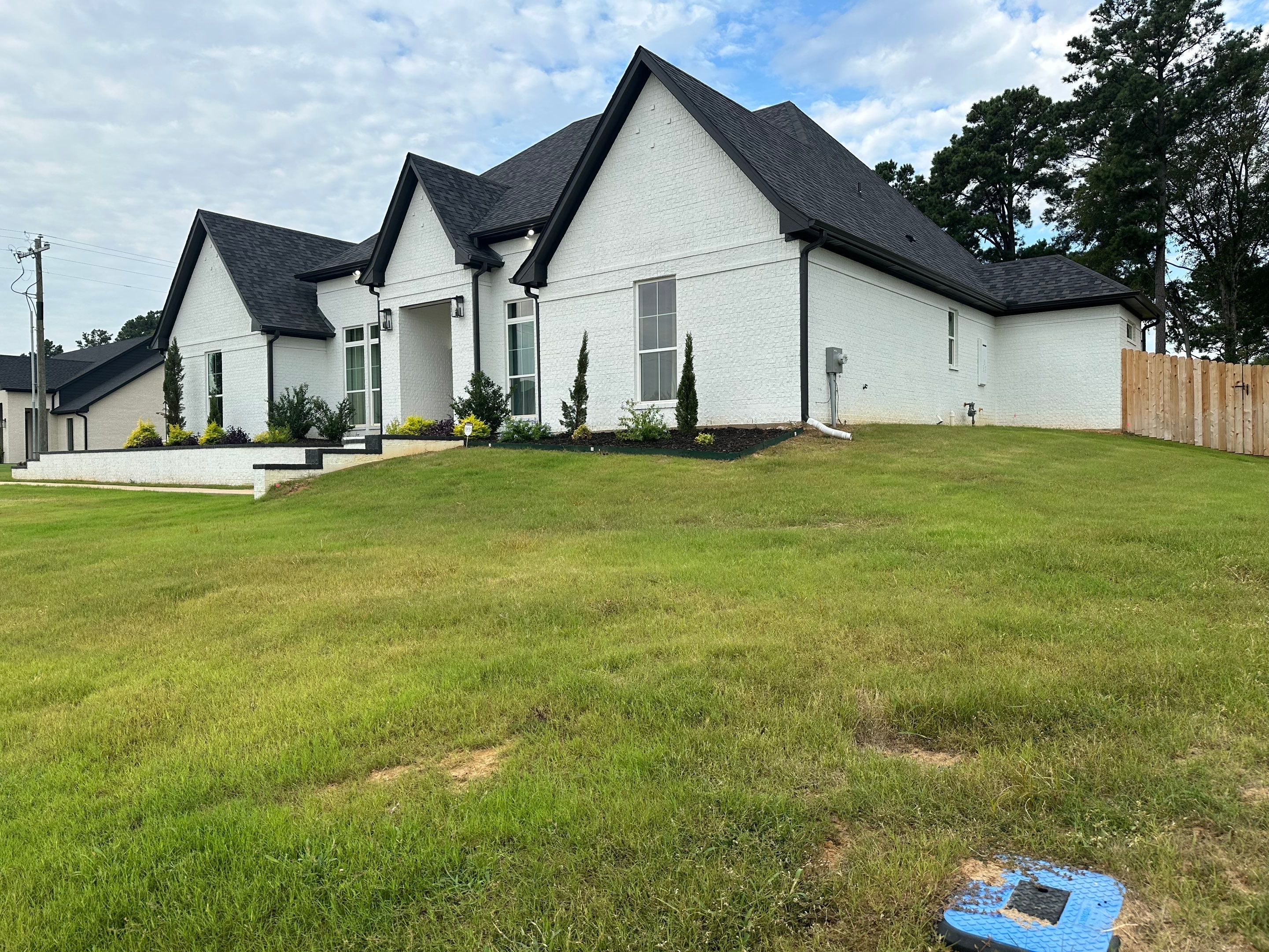 Exterior Painting in Longview, TX | Roof & Eaves in Elegant Black by Quality Coats Painting