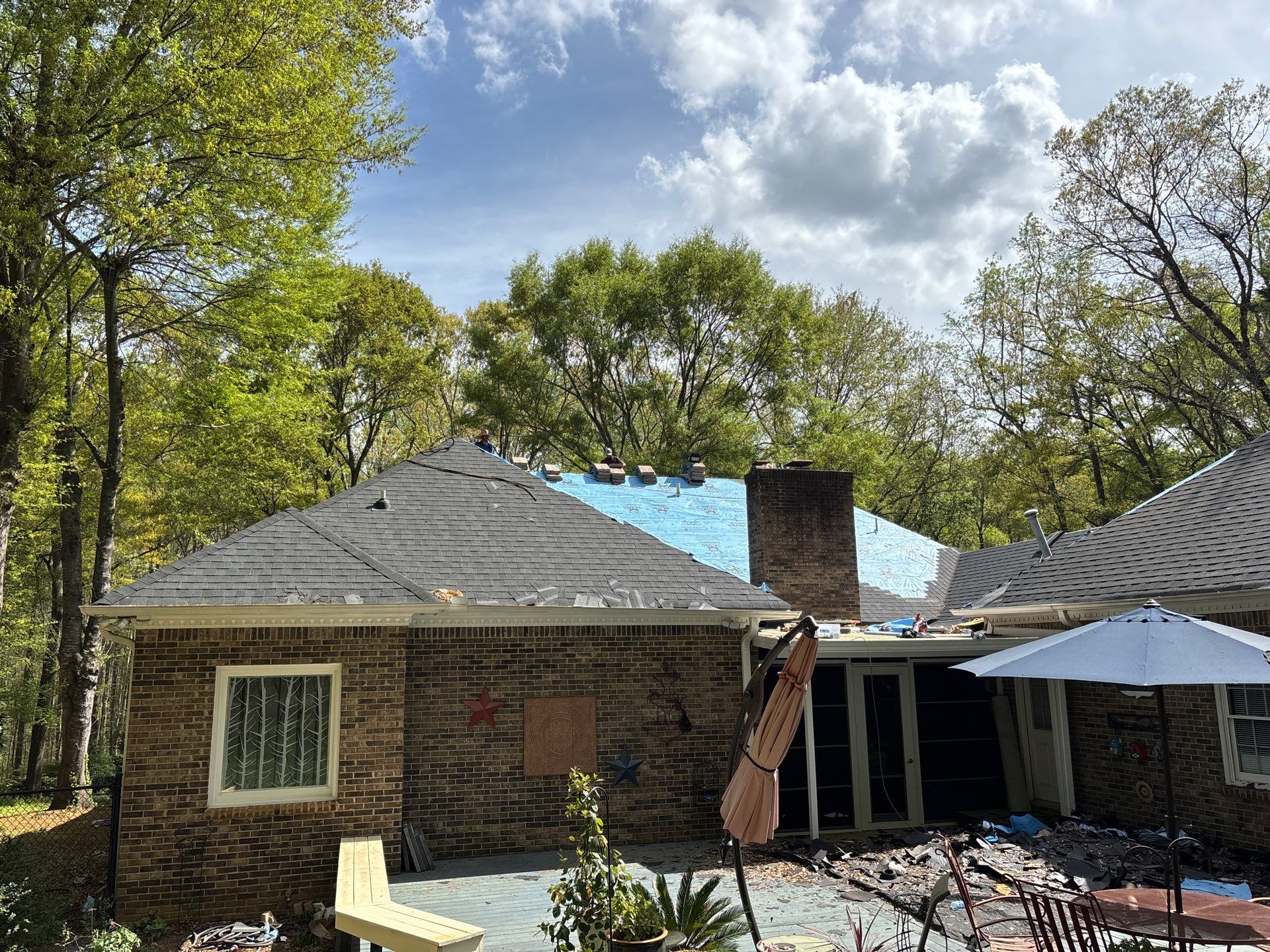 Spartanburg Residential Roof Replacement with Architectural Shingles and Skylights by Roofers LLC
