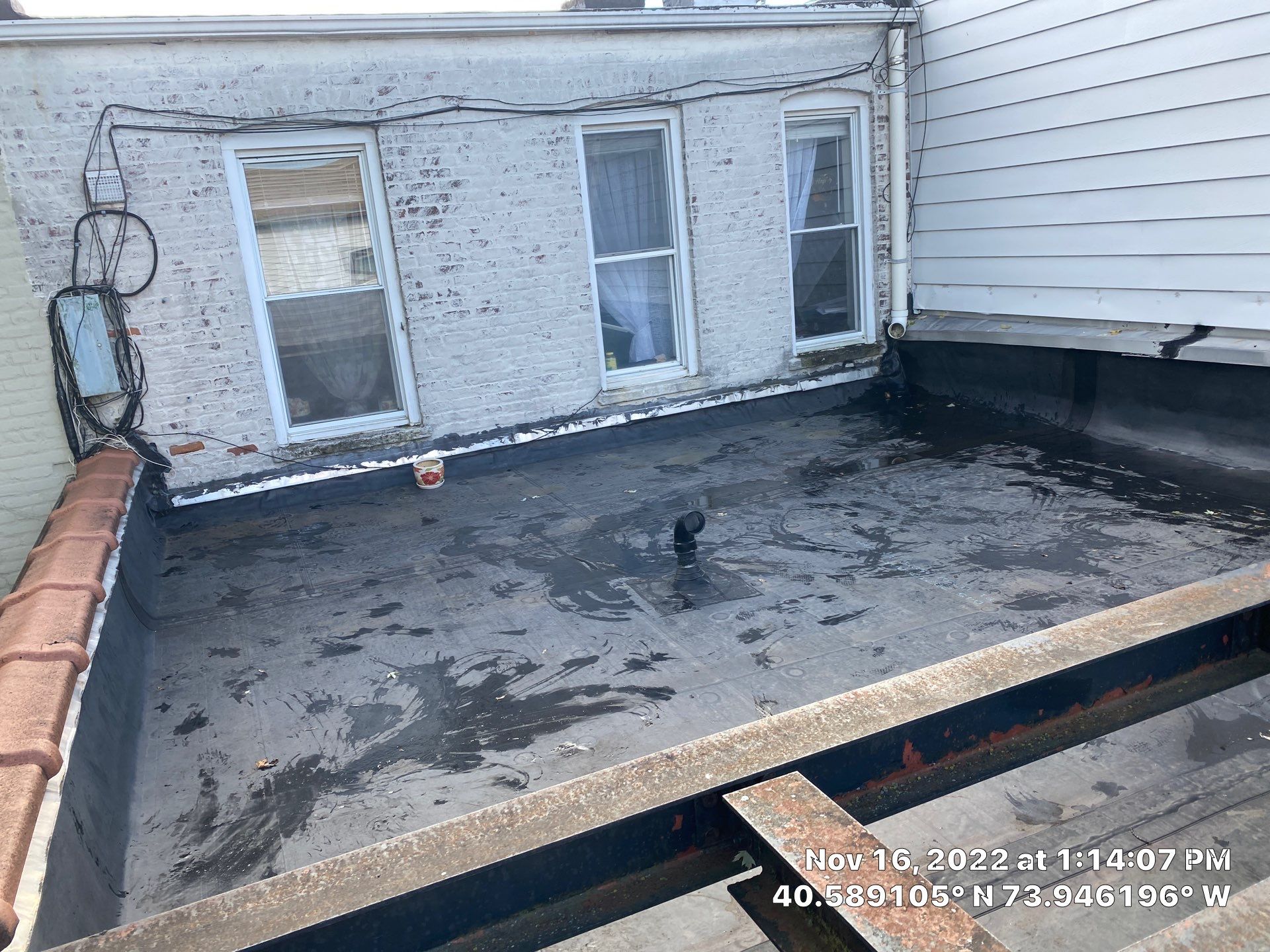 Flat Roof Cleanup Brooklyn by Above All Gutters