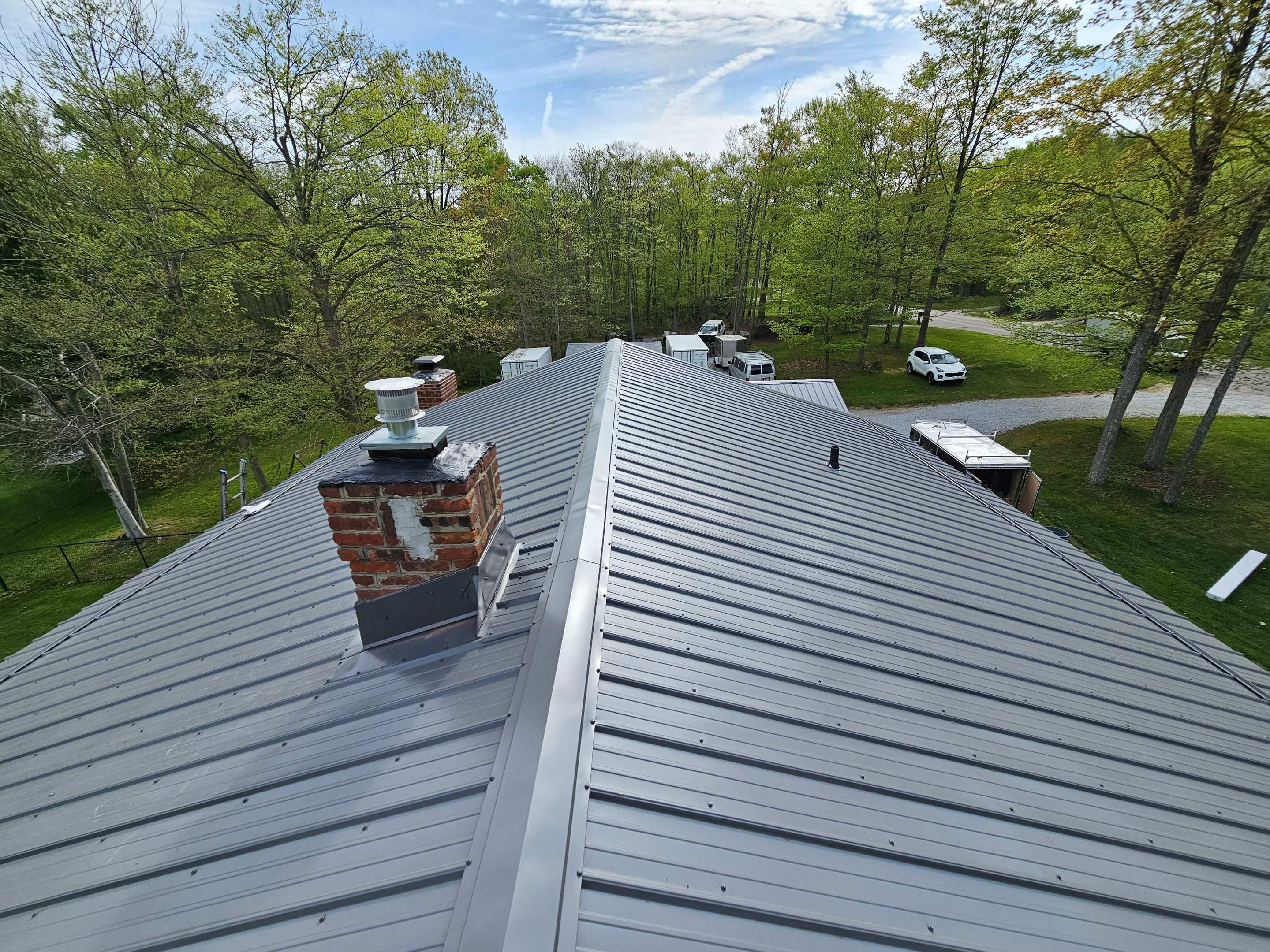 Metal Roof Installation, 6" Gutters and Cedar Siding Restoration by Pally Roofing