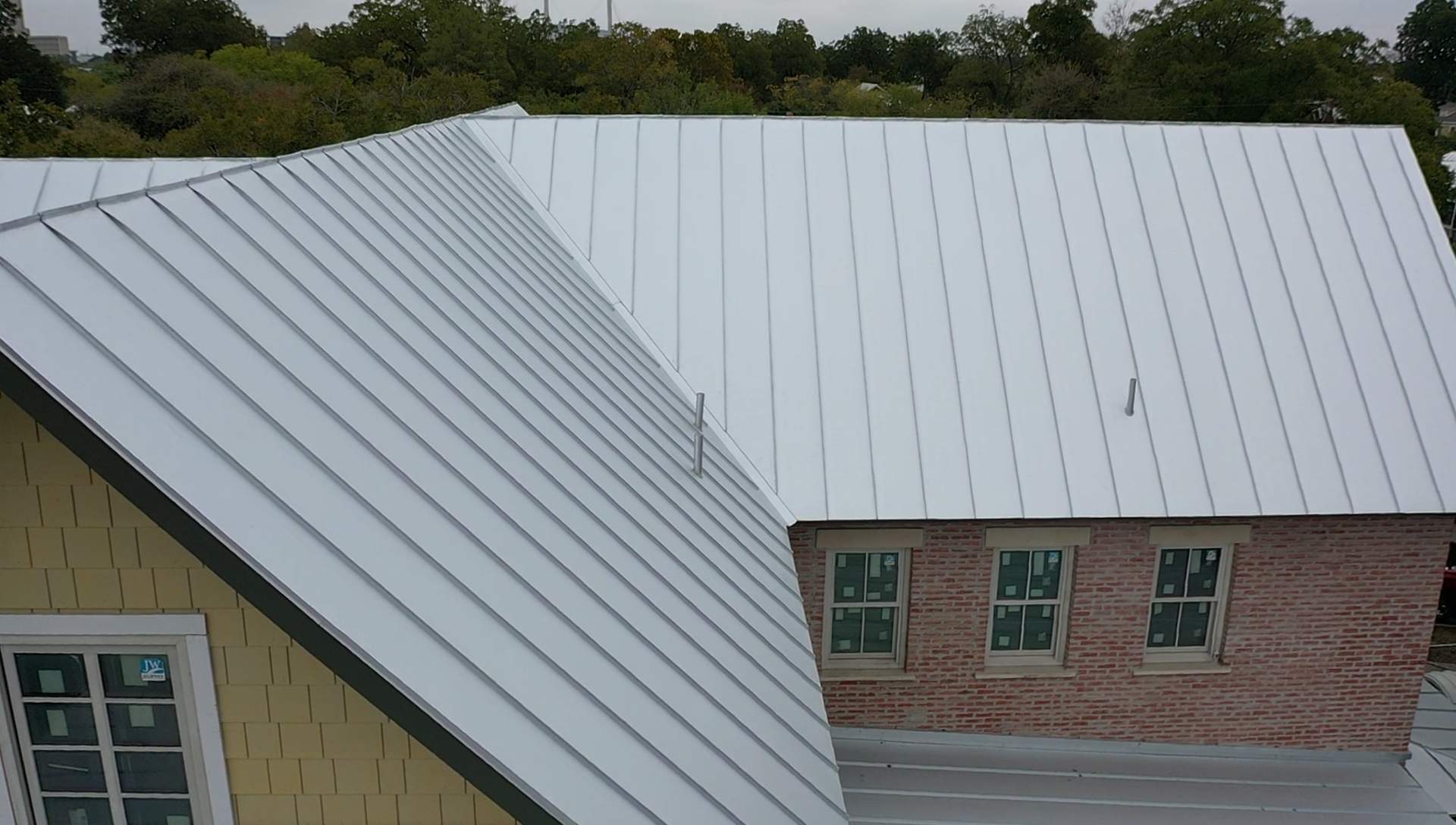 Residential Metal Roof Installation using McElroy Metal by Premier Roofing and Contracting