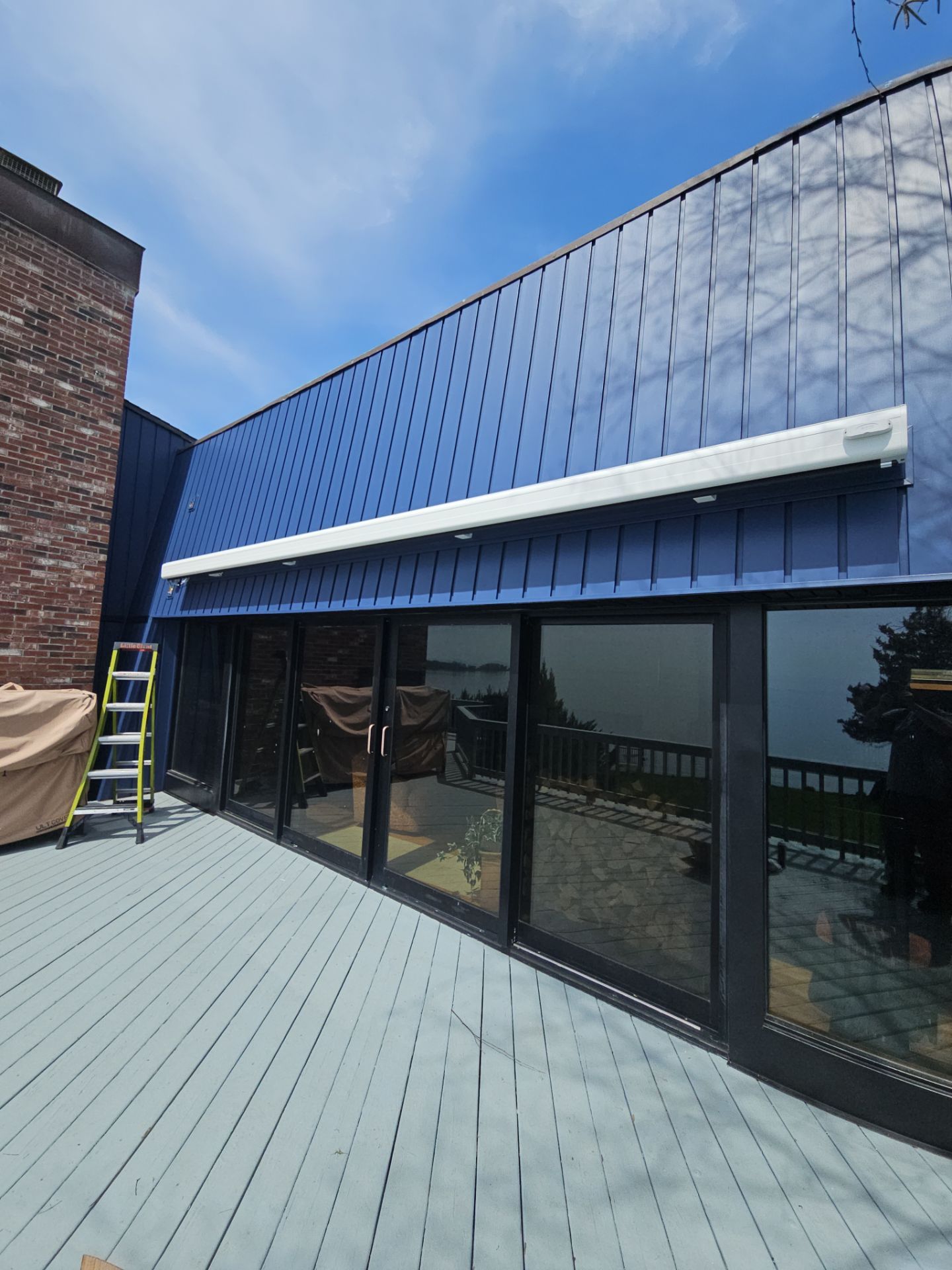 SummerSpace Awning Installation for Sleek Shade & Outdoor Living by DiGiorgi Roofing and Siding Inc