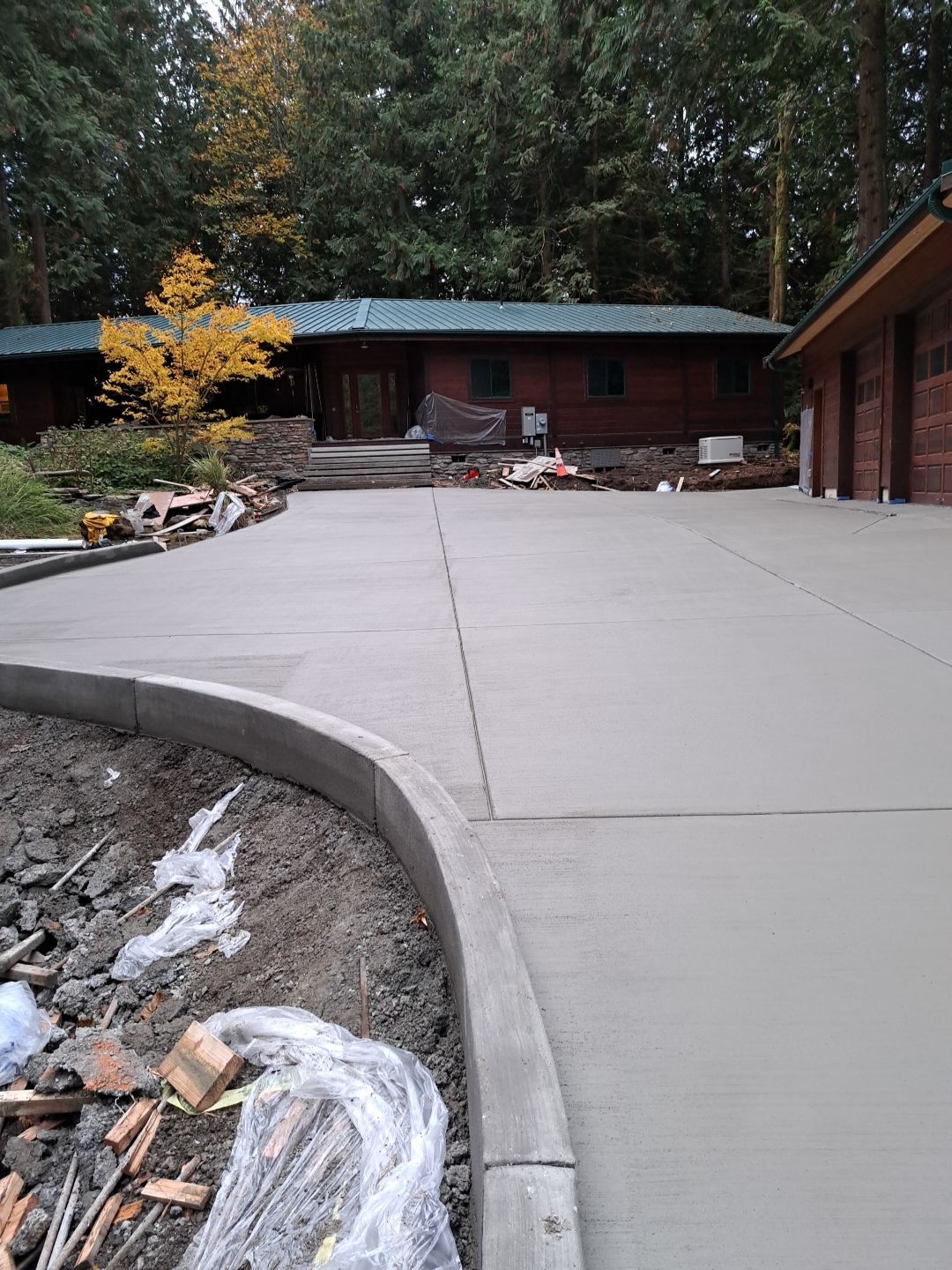 Pia | Custom Concrete Driveway, Walkway & Floating Steps by Jireh Asphalt & Concrete Inc 