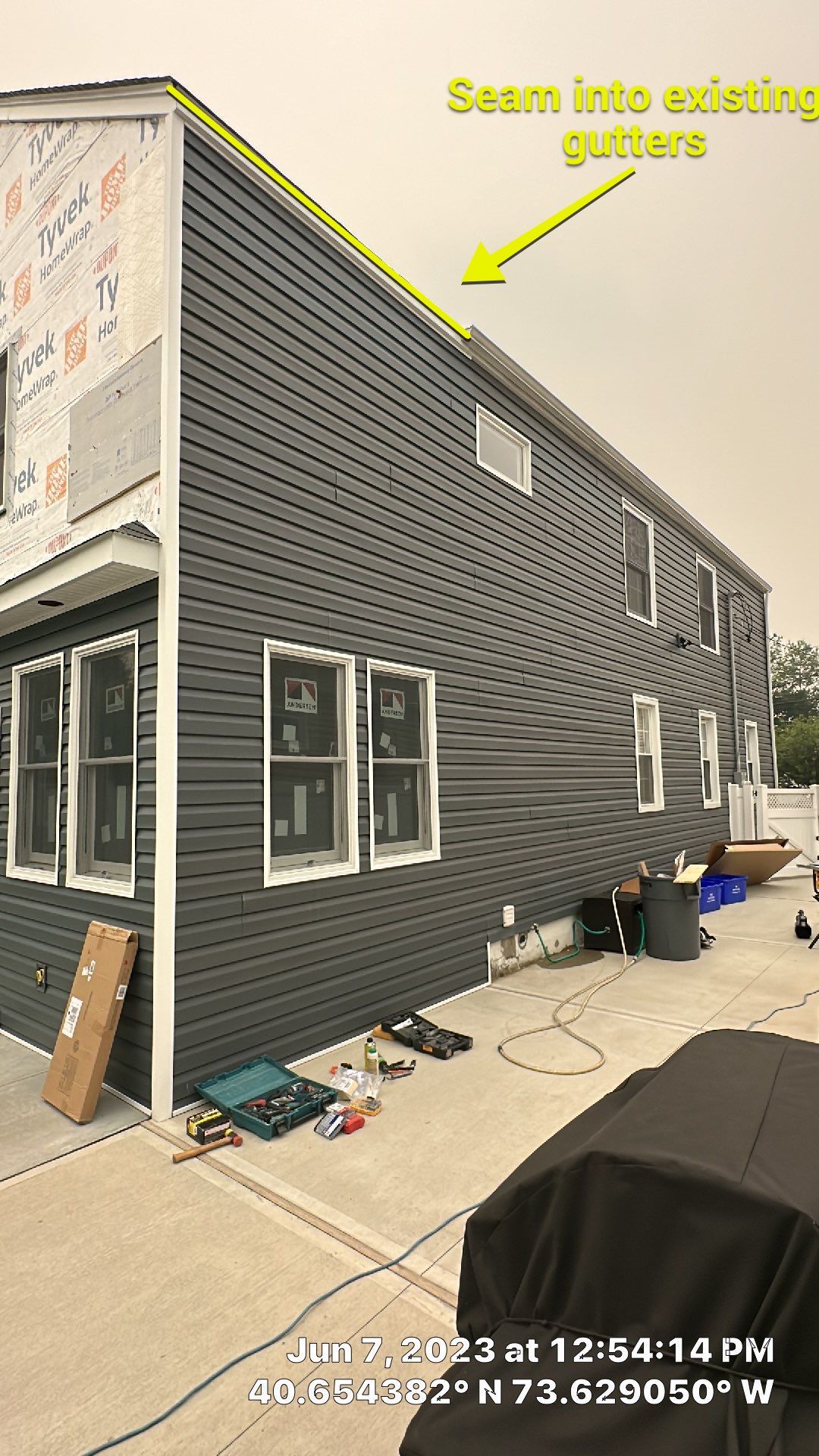 Gutter Installation using 5"white K style seamless gutters and 2x3 white leaders by Above All Gutters 