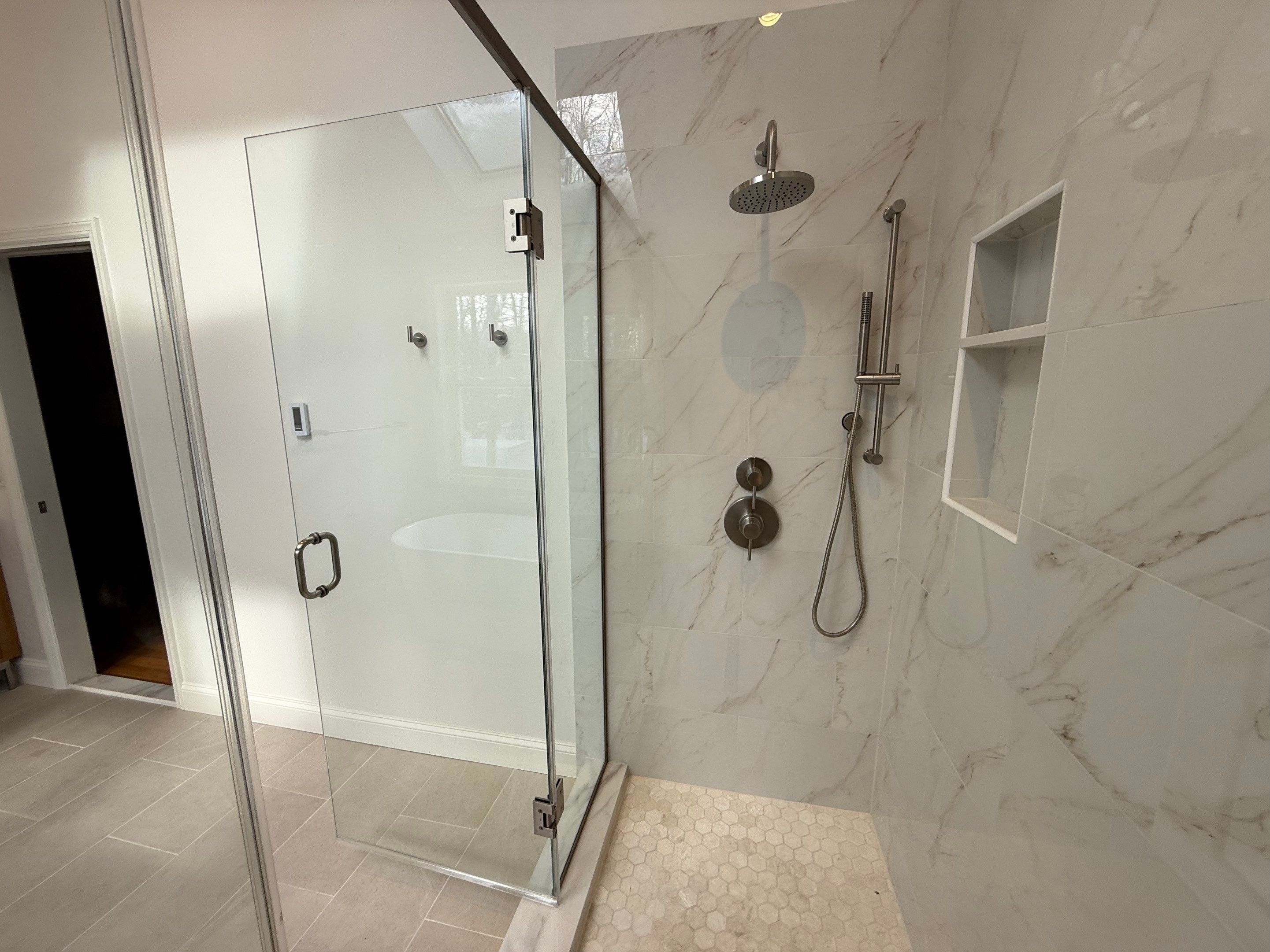 Bathroom Remodel using Tile by Home Concepts Construction