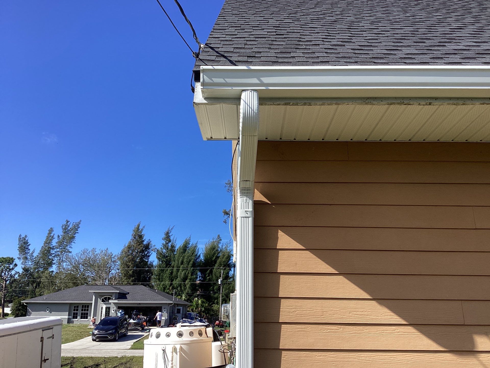 Soffit & Fascia White + New Downspouts by Gutter Professors