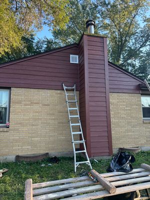 LP SmartSide siding install in Johnsburg, IL — After