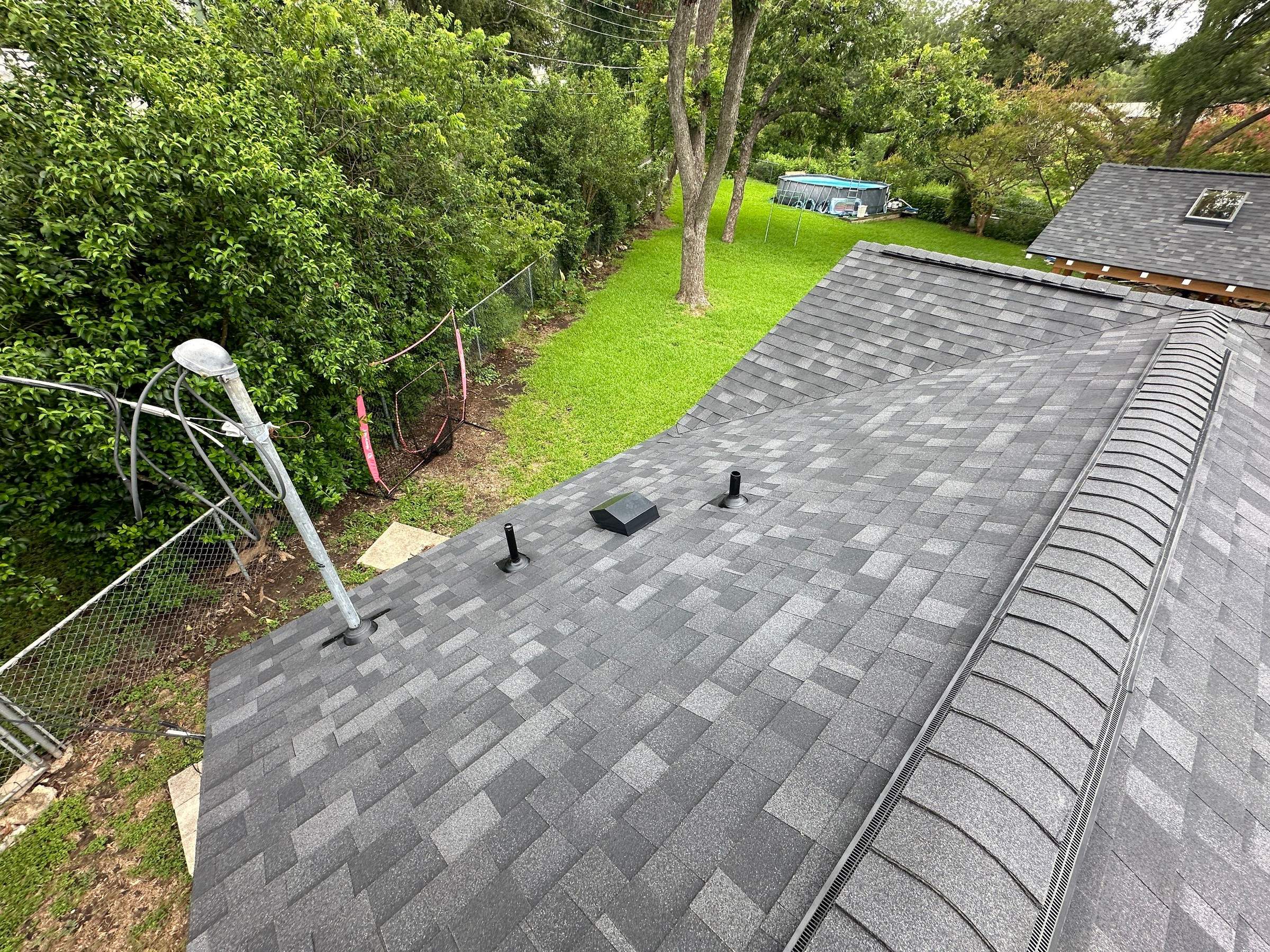 Onyx Black Oakridge Roofing Around Austin Skylights by Skywall Construction LLC