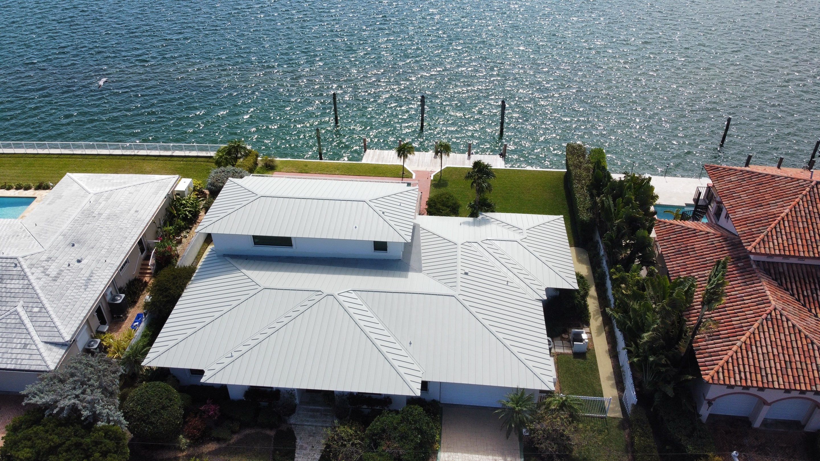 New Metal Standing Seam Install by Earl W. Johnston Roofing 