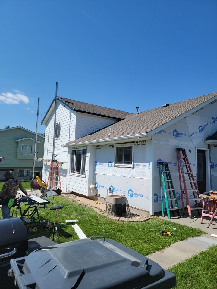 New and Improved Siding by Weather-Tite Exteriors LLC