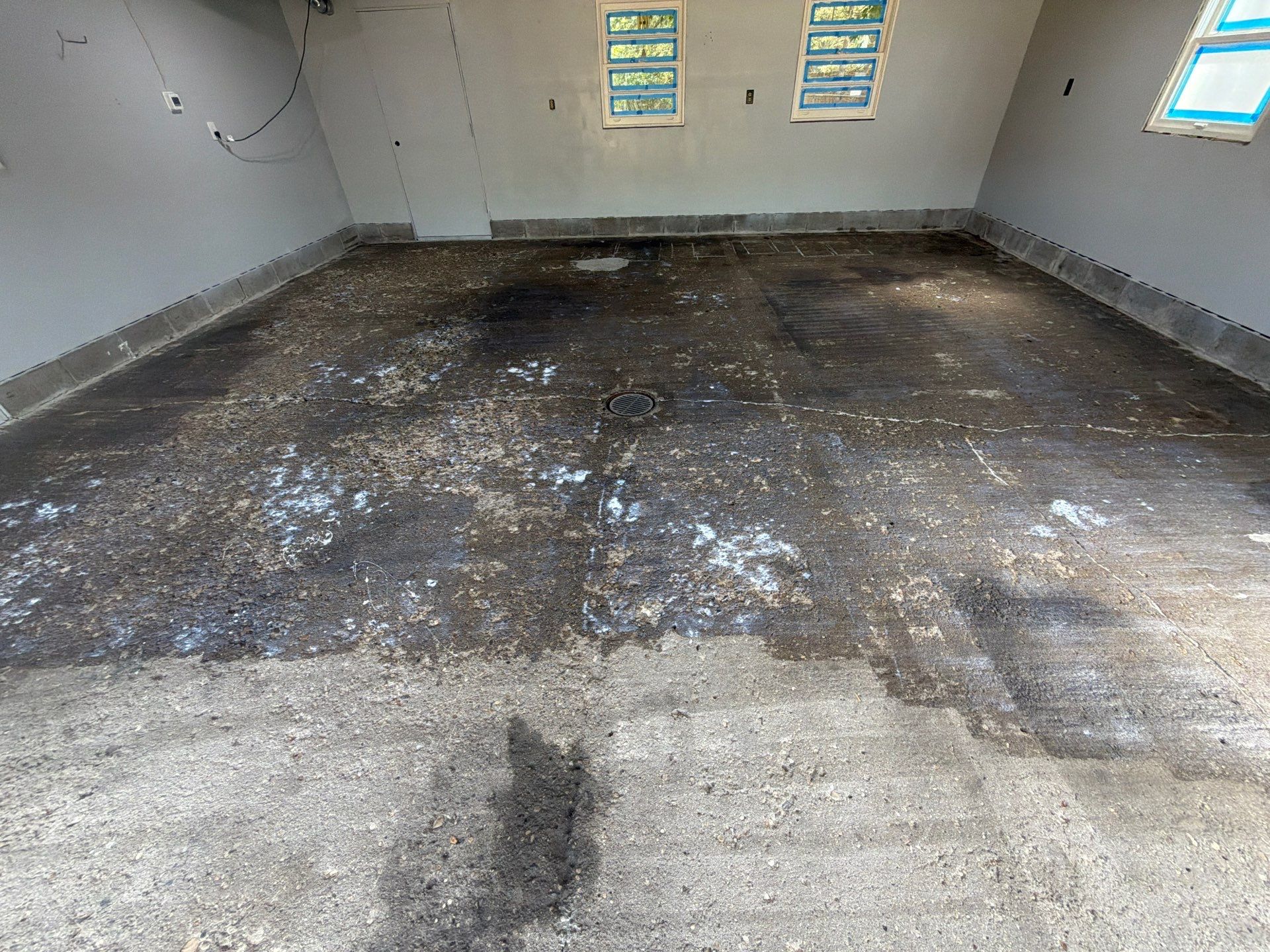 Garage Epoxy Flake Floor Installation and Exterior Siding Repairs in Muskegon by Gordon Painting