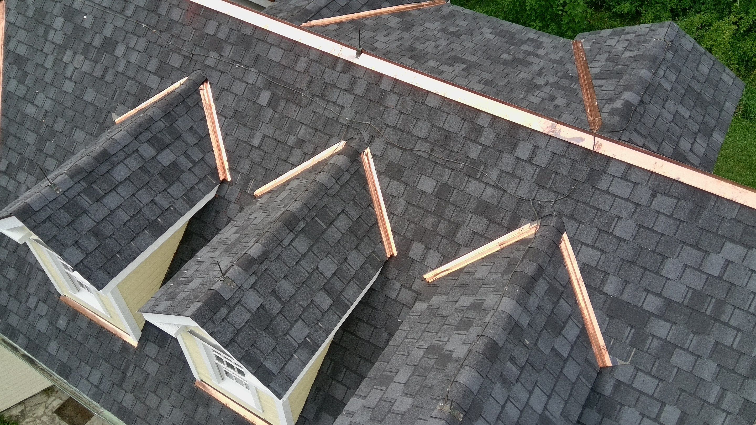 Re-roof: Certainteed Belmont in Black Granite with Custom Copper by Midwest Building Solutions