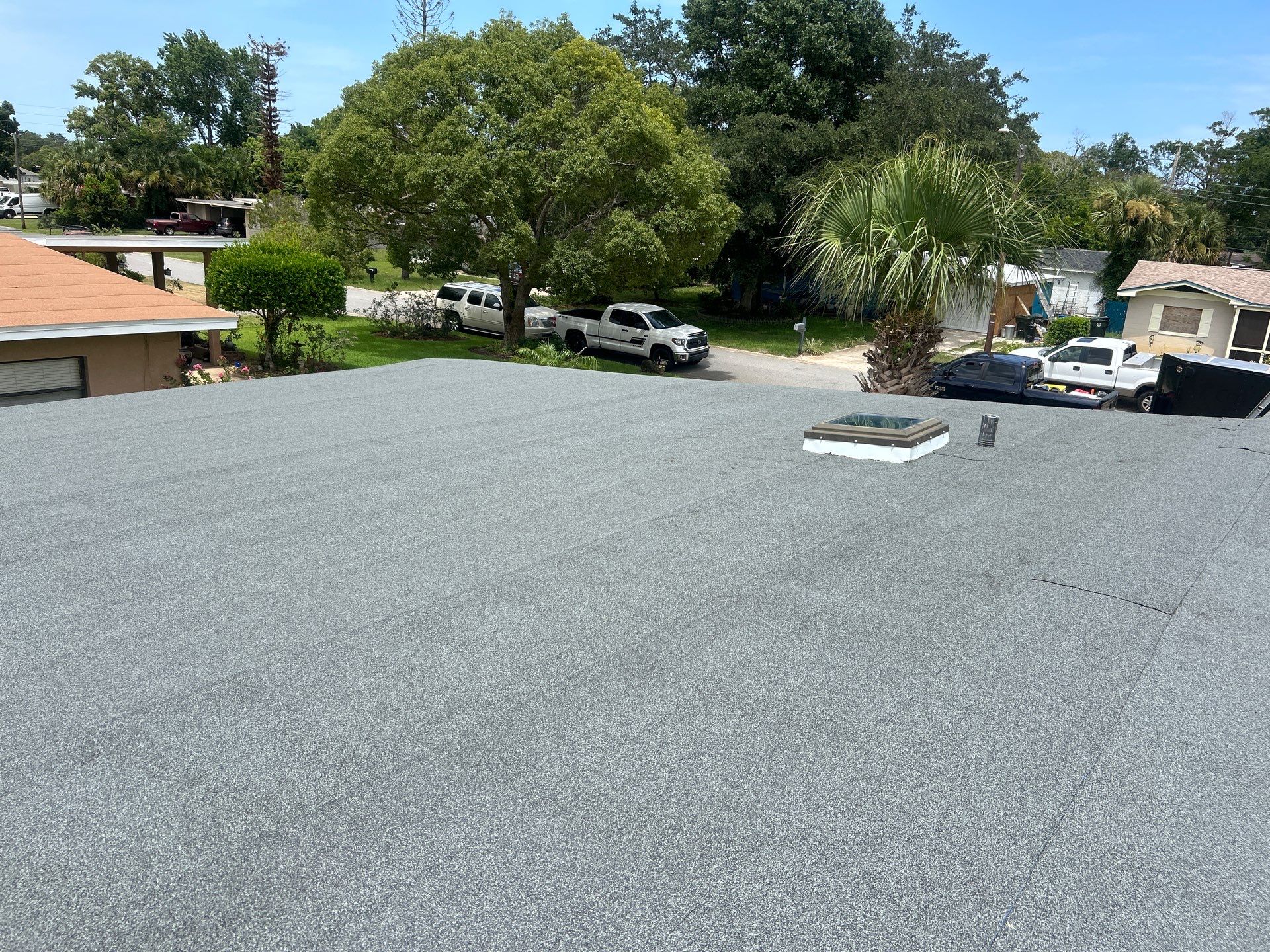 Colonial Slate Modified Bitumen Flat Roof Replacement in Daytona Beach by Pinnacle Roofing Group