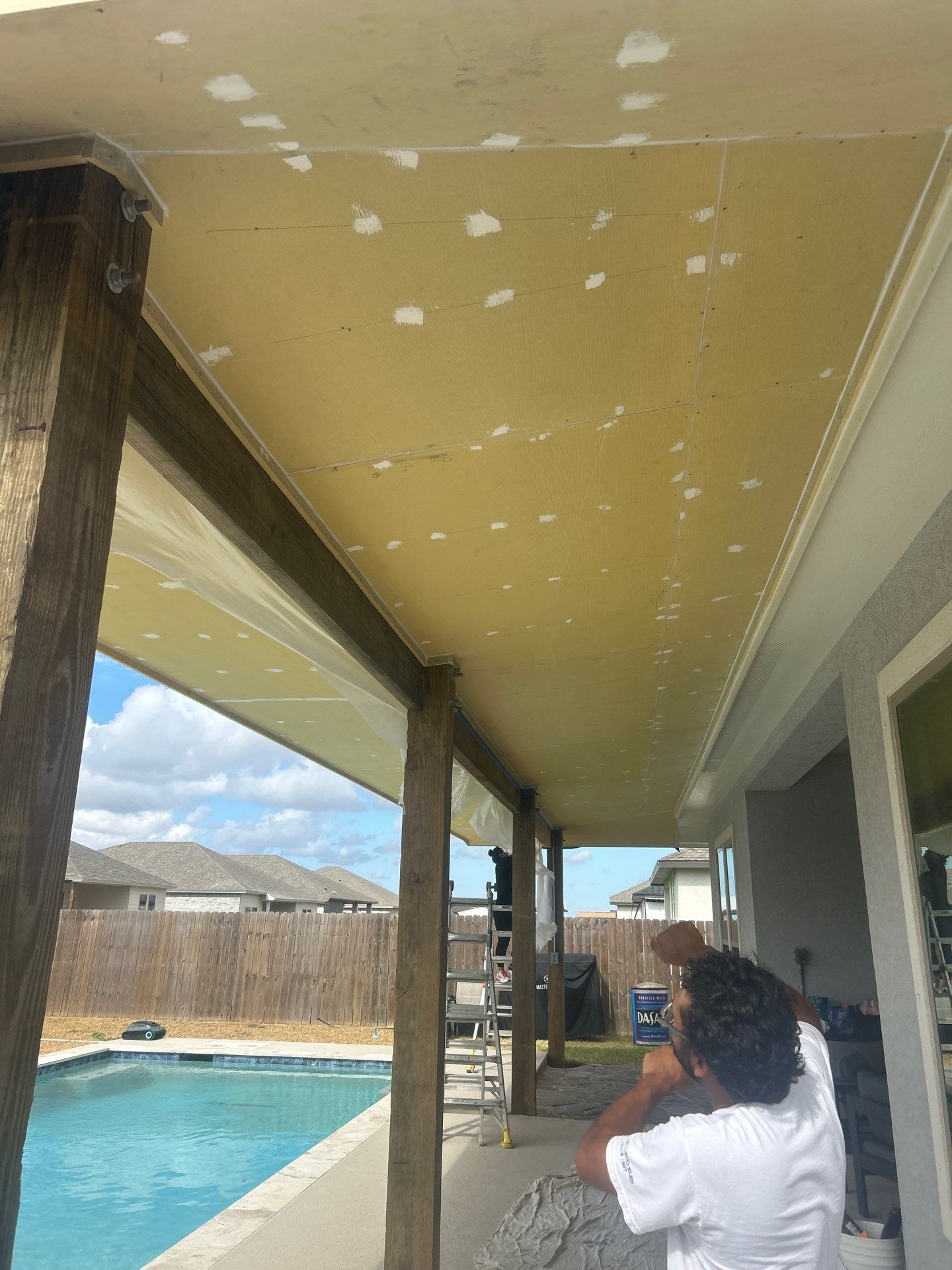 Patio Pool Cover by Bayfront Roofing and Construction
