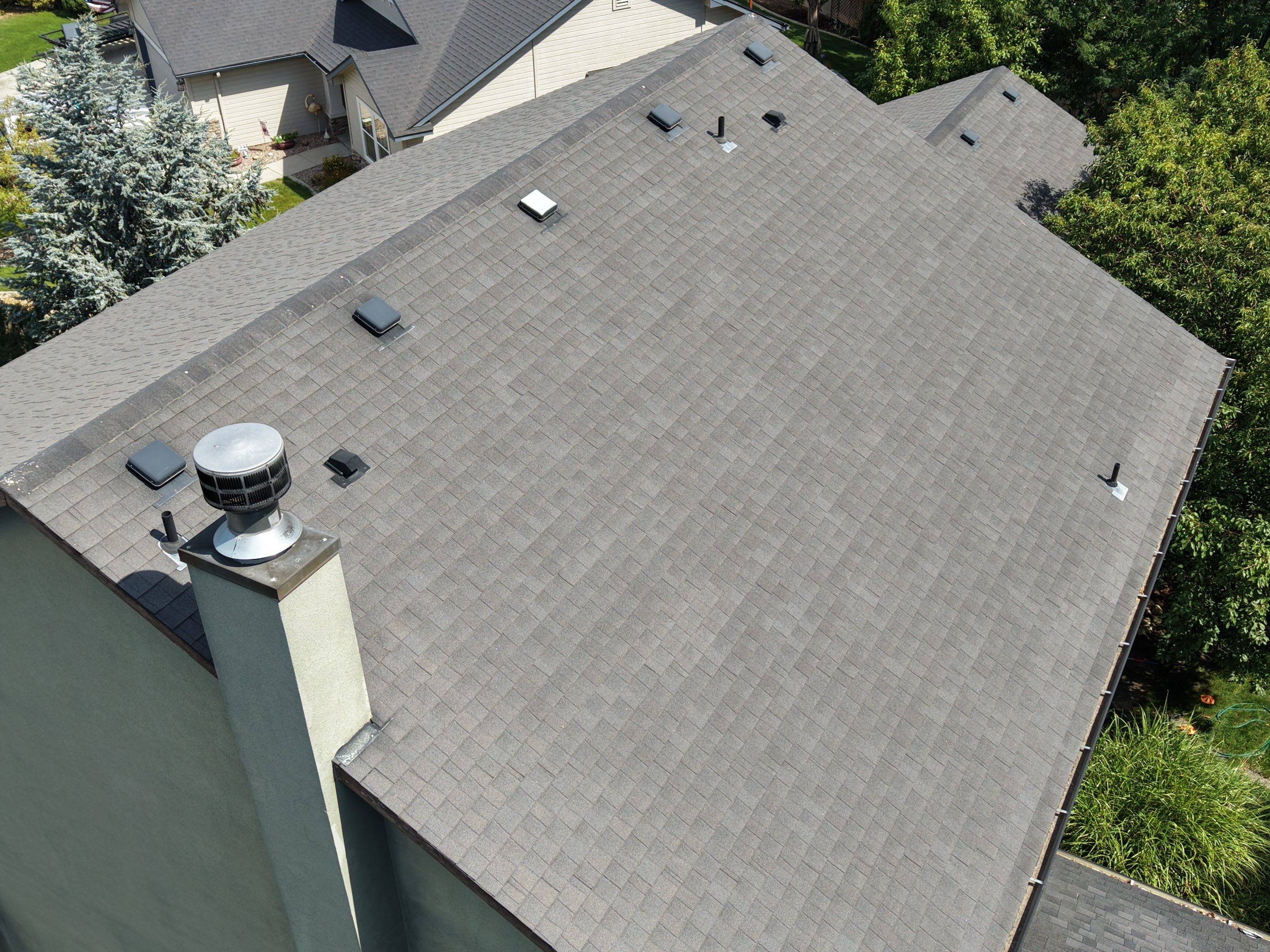 Residential Roof Replacement for Two-Story Stucco Home in Star by Olive Roofing