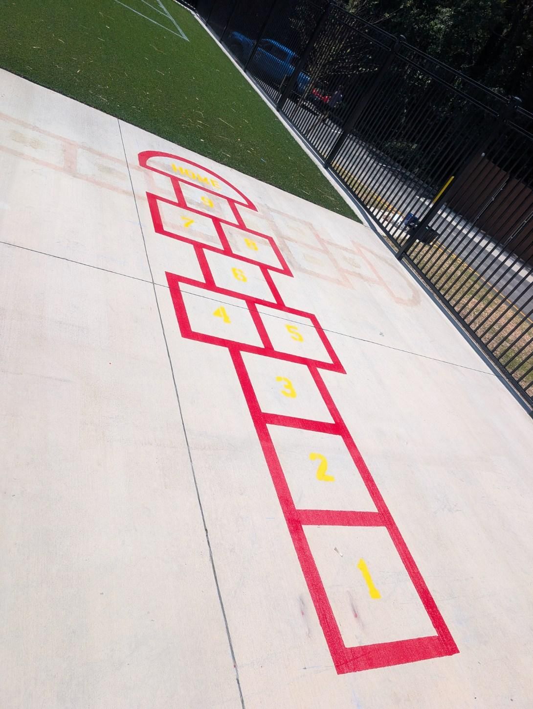 KinderCare Playground Turf and Custom Athletic Striping in Fredericksburg by Southwest Greens Midwest