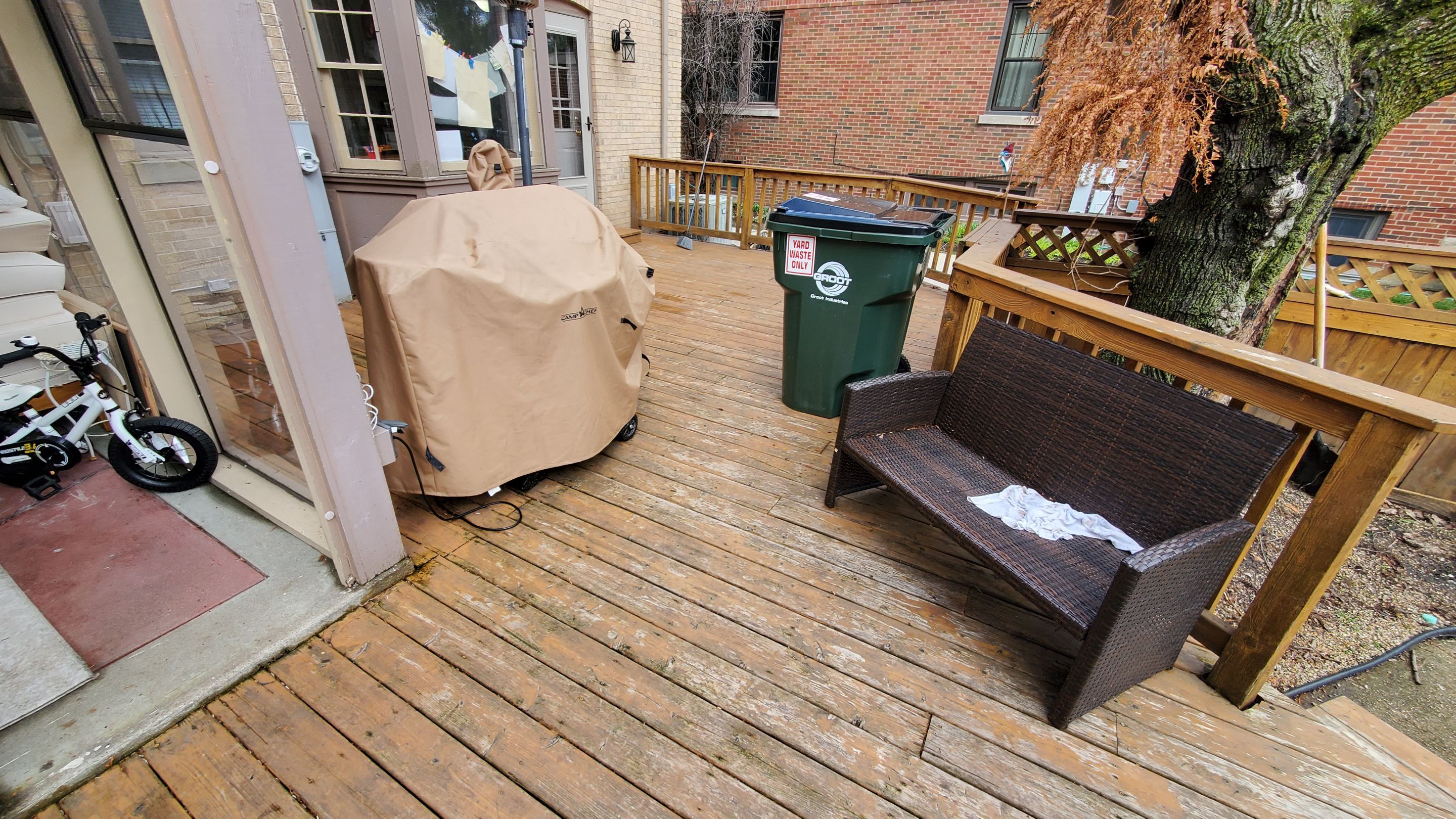 Wood cleaning and staining using Armstrong cloark oil stain by Northern Power Washing LLC.