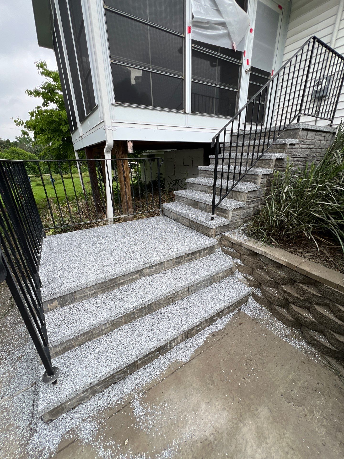 Silverado porch and steps coating by NG Masonry & Construction LLC