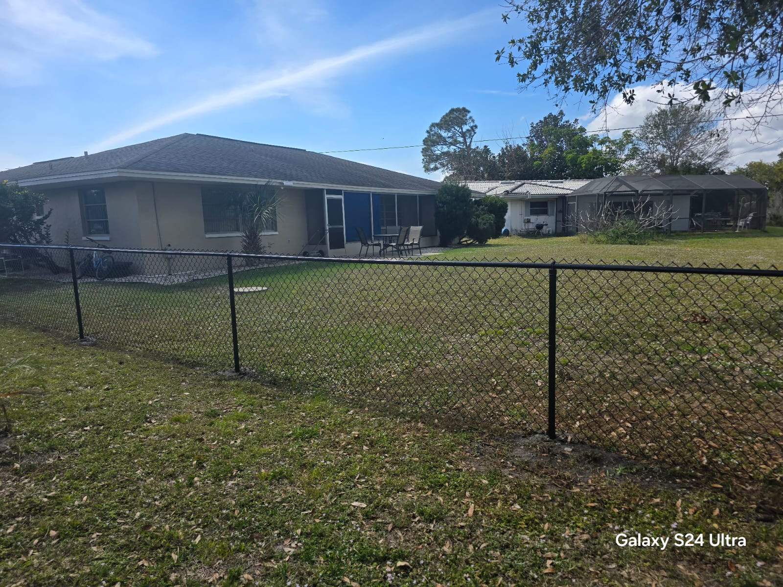 Black Chain Link Fence Installation for Port Charlotte Residence by True Fence LLC
