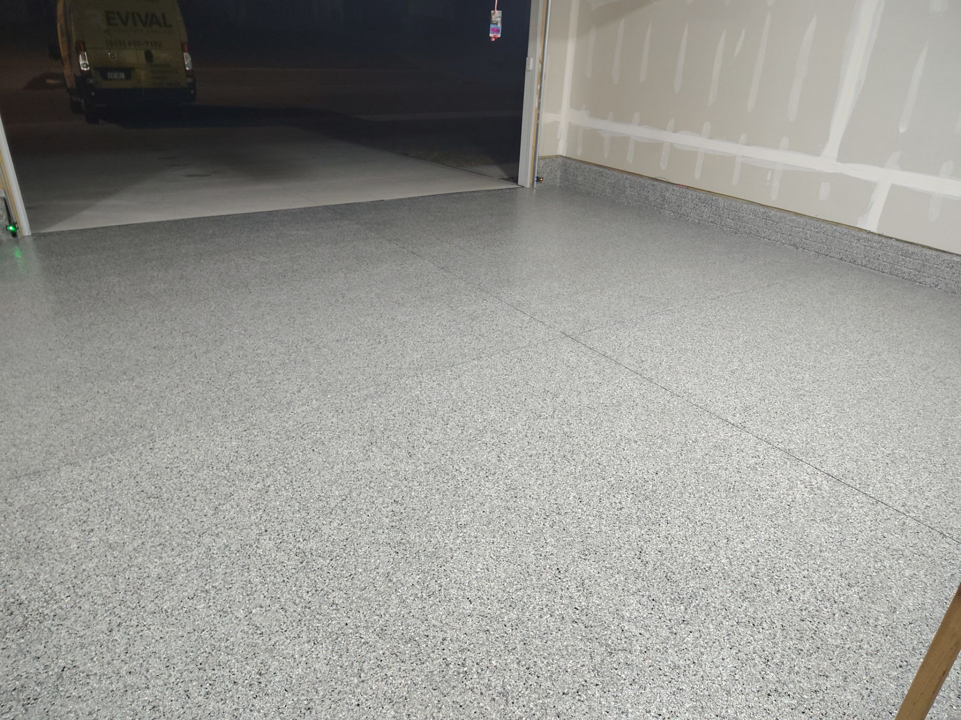 Adel, IA Garage: Complete Keystone Wrap on Floors, Stairs, and Stem Walls by Revival Concrete Coatings