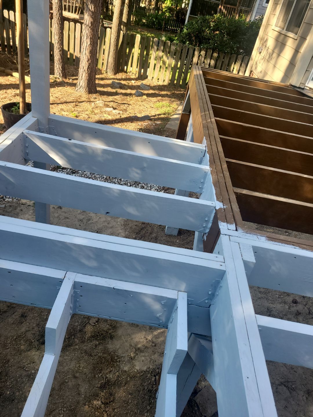 Fuquay-Varina Outdoor Upgrade – Composite Deck & Paved Landing by Elite Remodeling and Design LLC