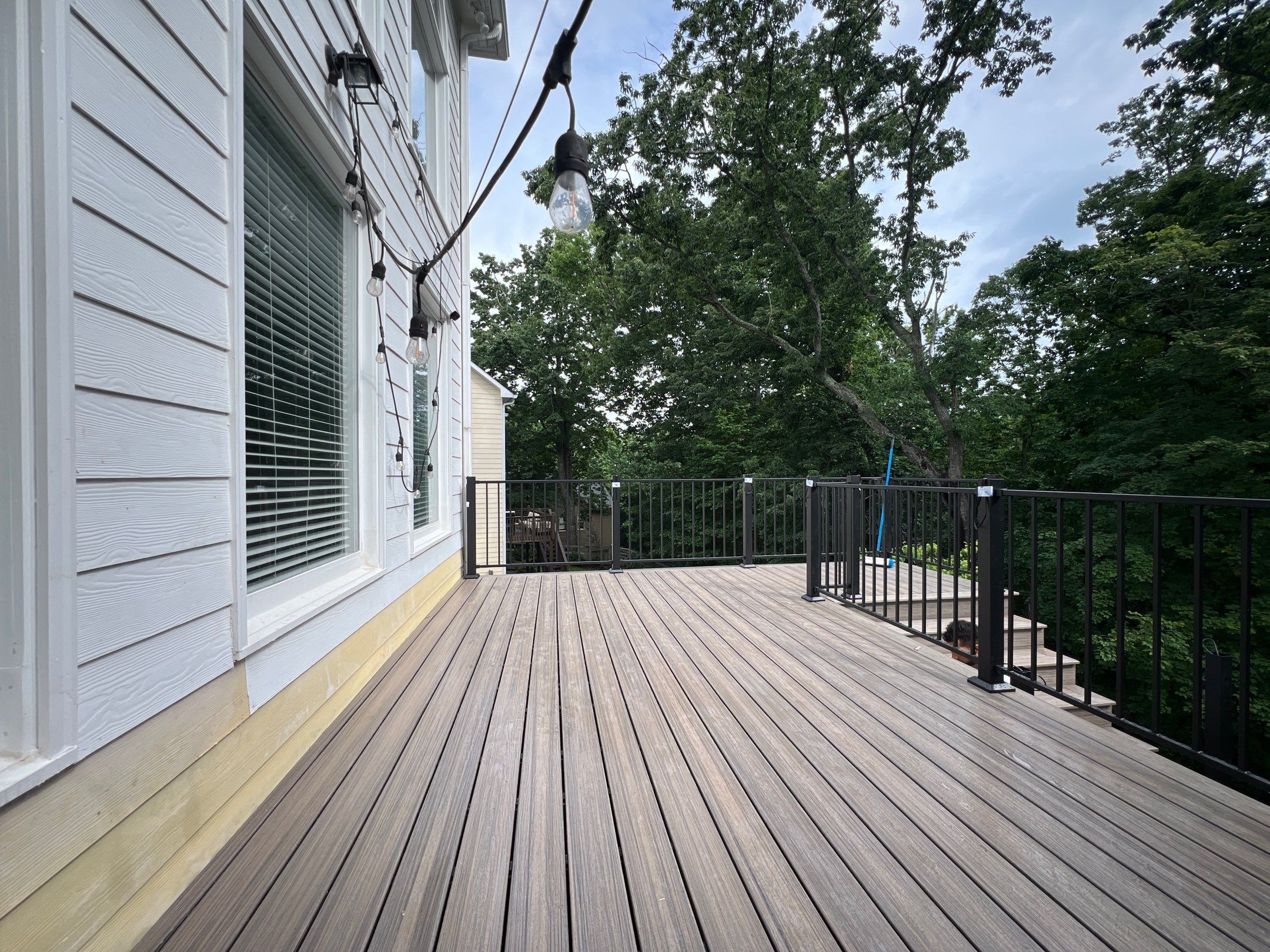 Elevated Composite Deck and Concrete Landing Installation in Kennesaw by Swift Home Renovations
