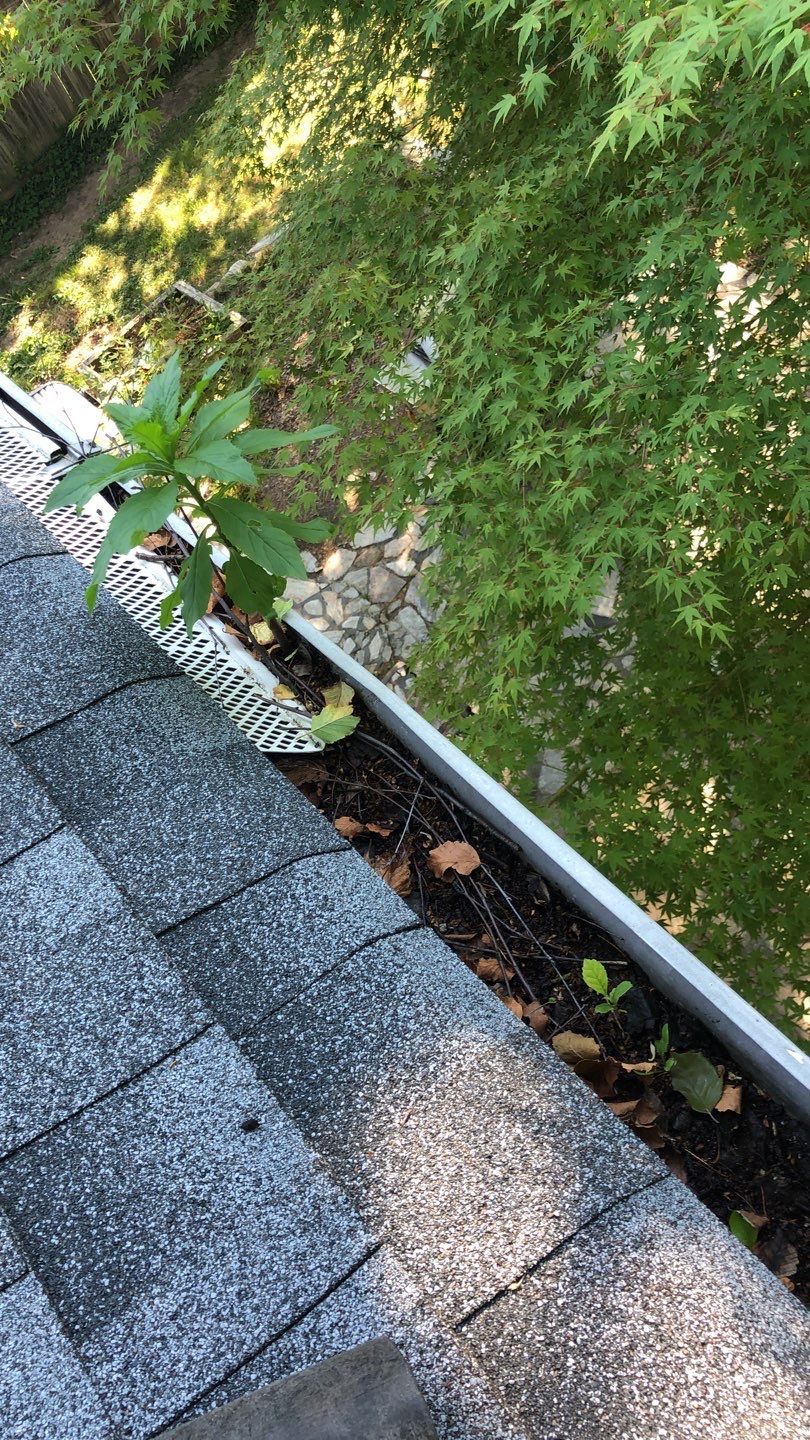 Gutter Cleaning by American Home Contractors