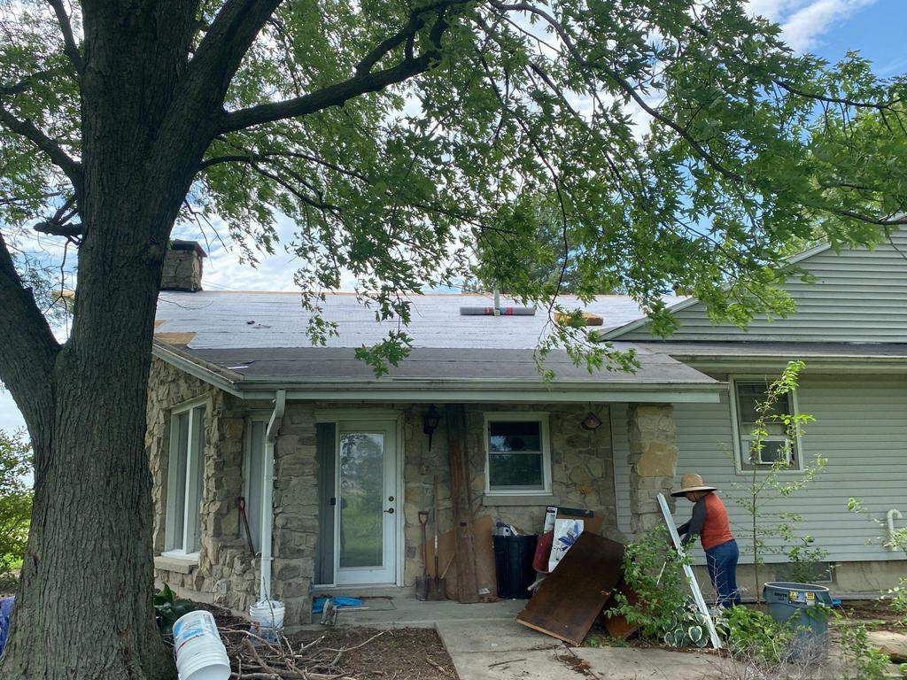 Storm damage roof replacement by Nitro Roofing and Construction