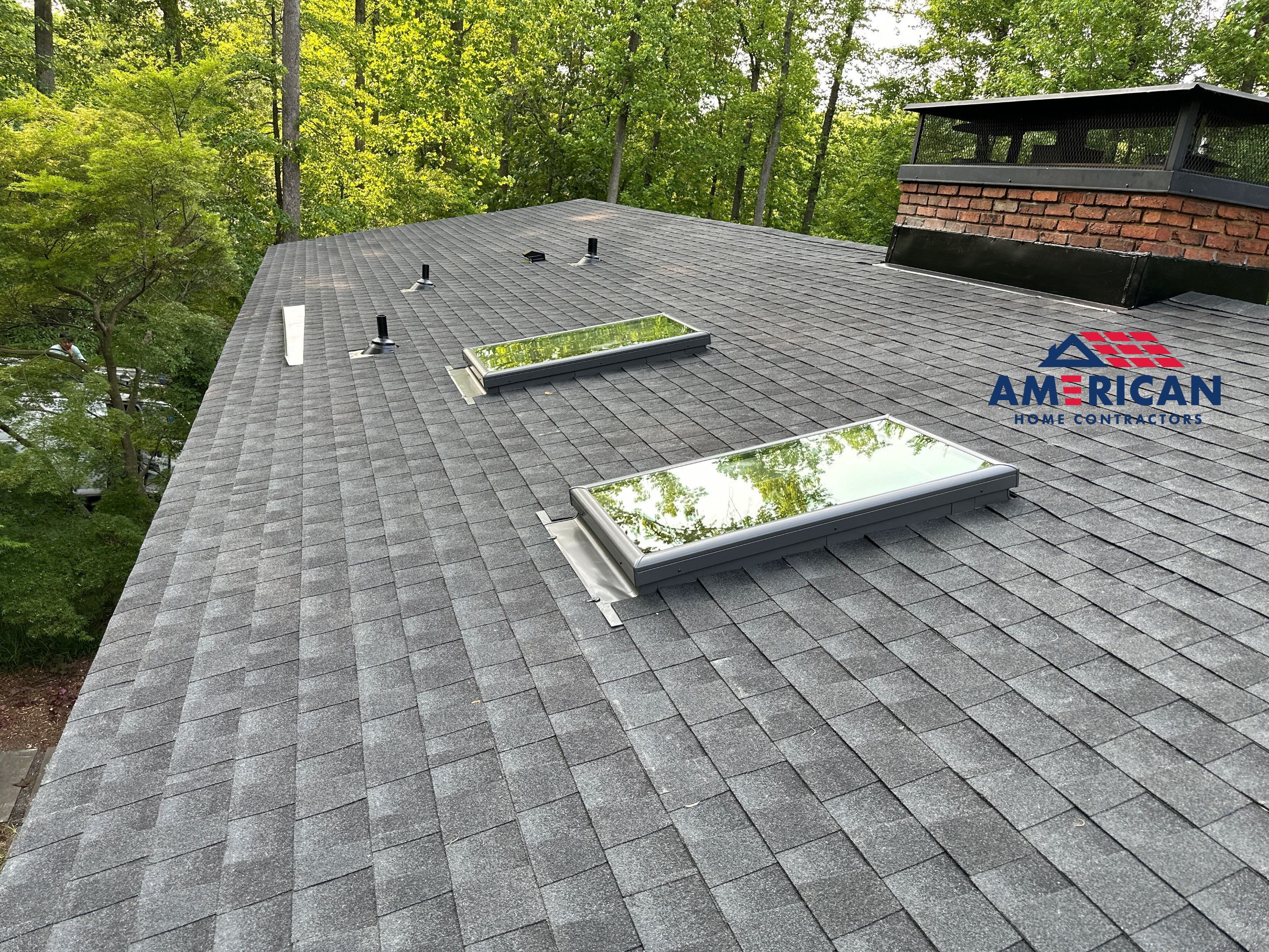 Acorn Deck House Roof Replacement + Skylight Addition by American Home Contractors