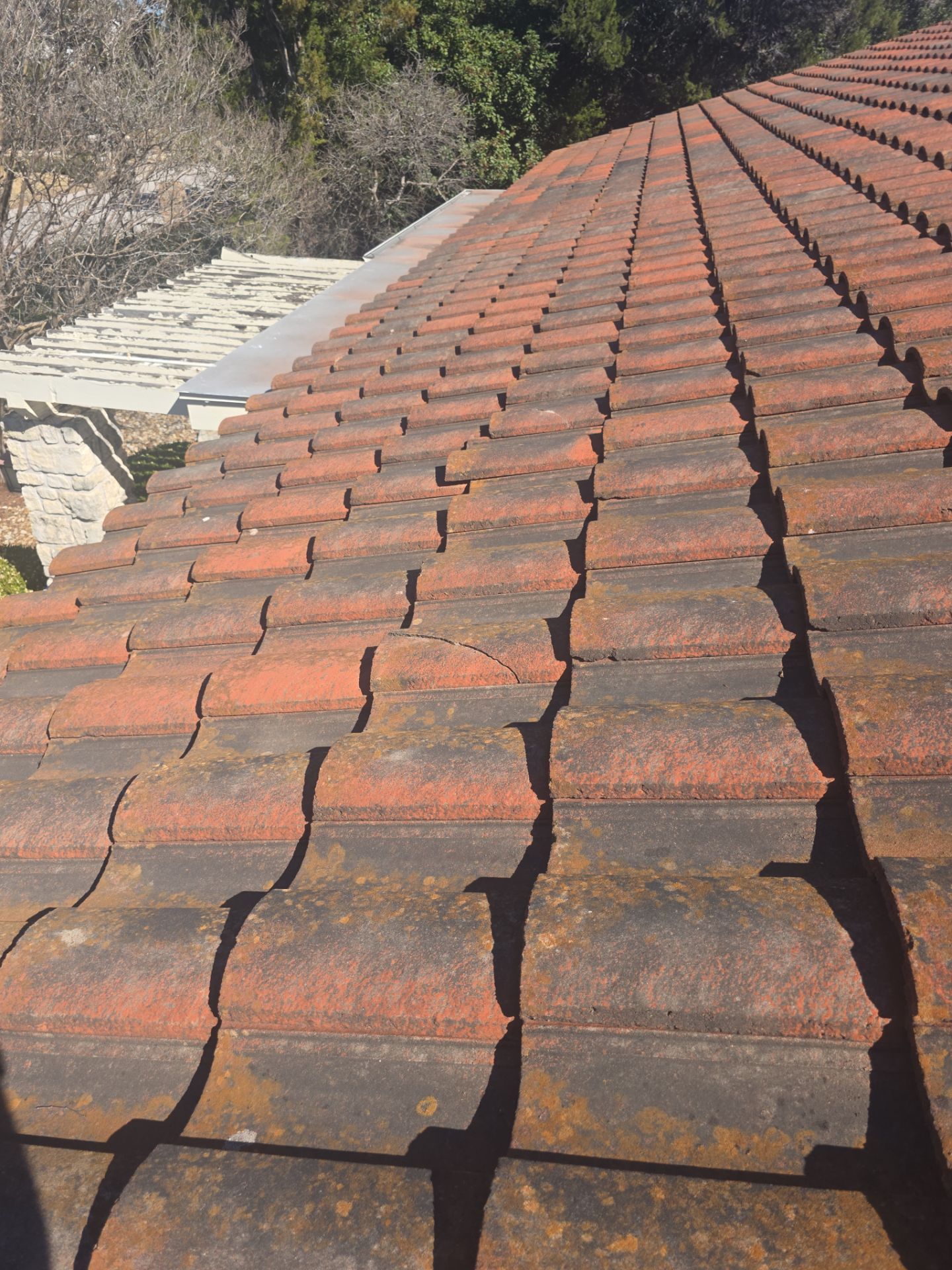 Specializing in tile roof repairs by REPS Austin Area Roofer