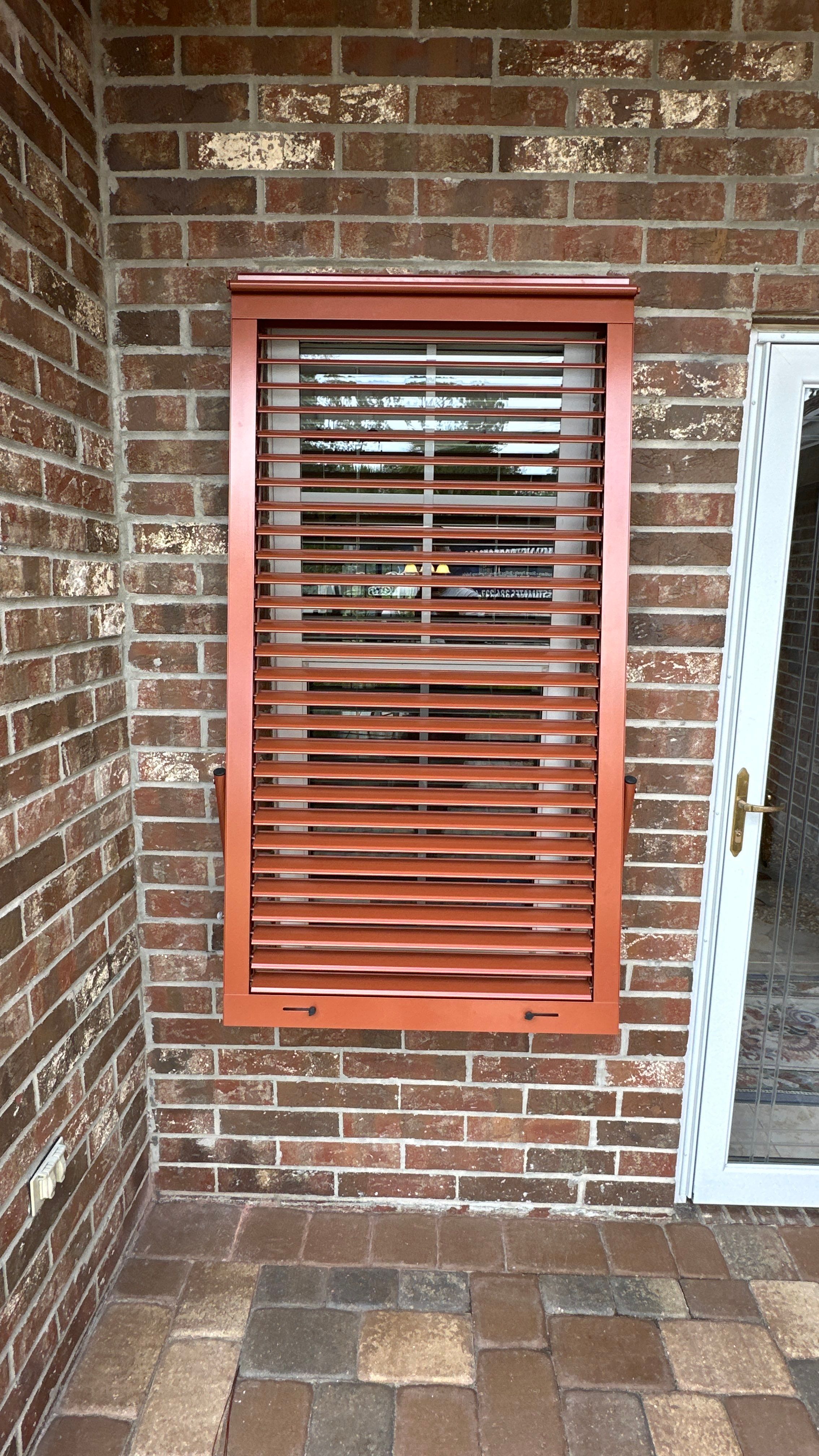 Impact Bahamas in Pearl Copper  by Smart Guard Shutters
