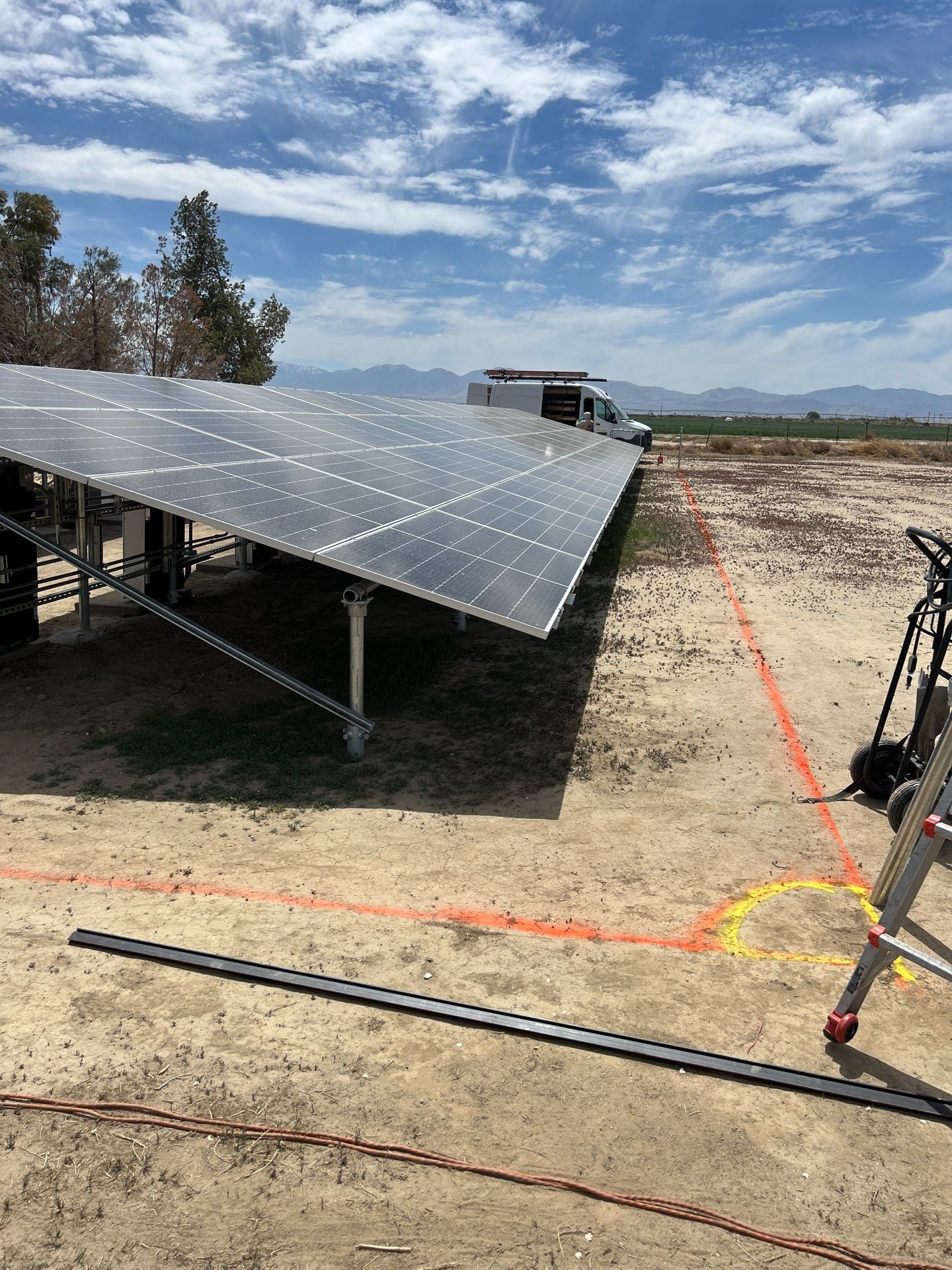 Large-Scale Ground-Mount Solar and Tesla Powerwall Battery Installation by AWS Solar