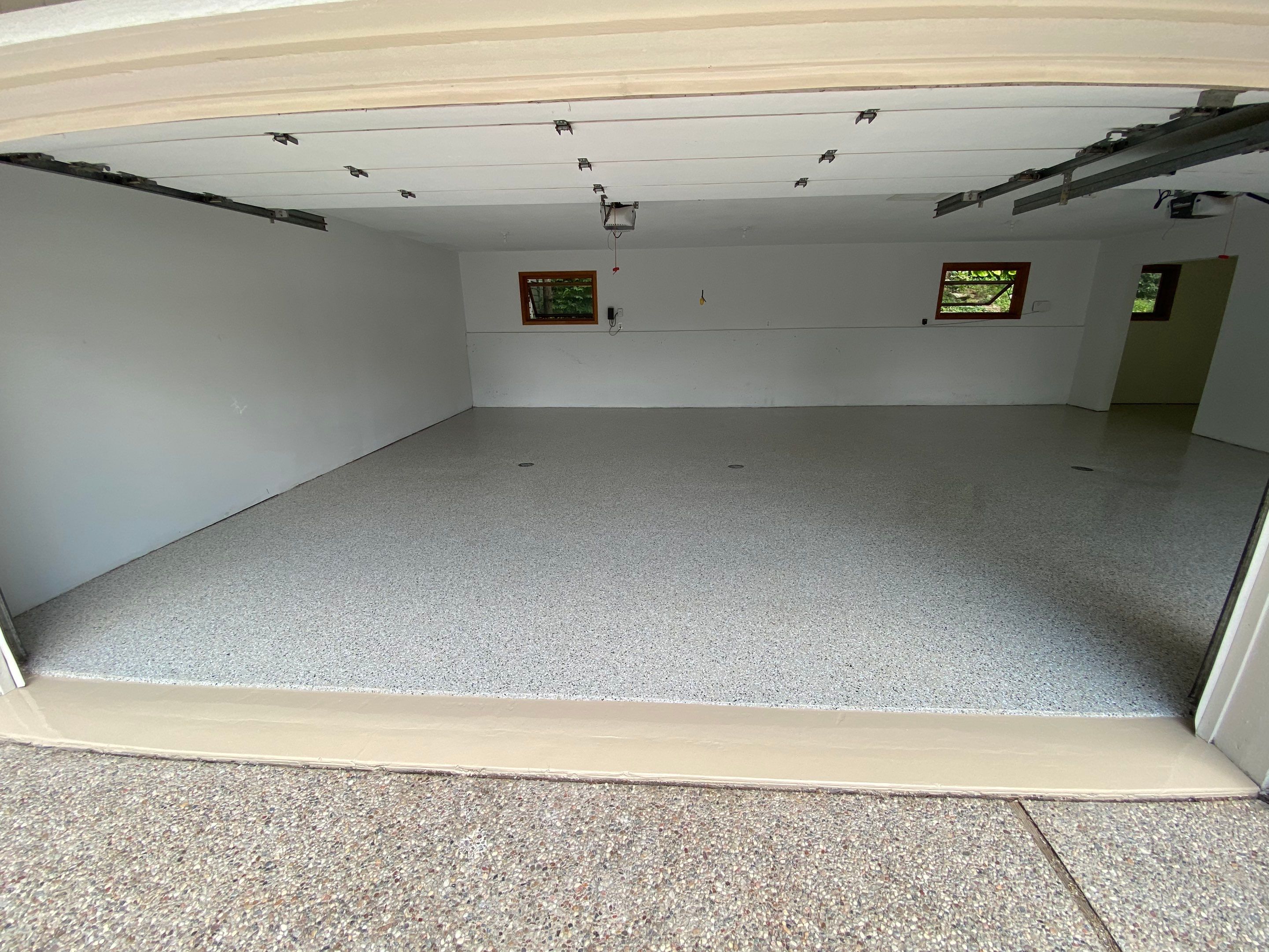 Briarcliff Northland -- Epoxy Garage Before and After by Big Red Decorative Concrete, LLC