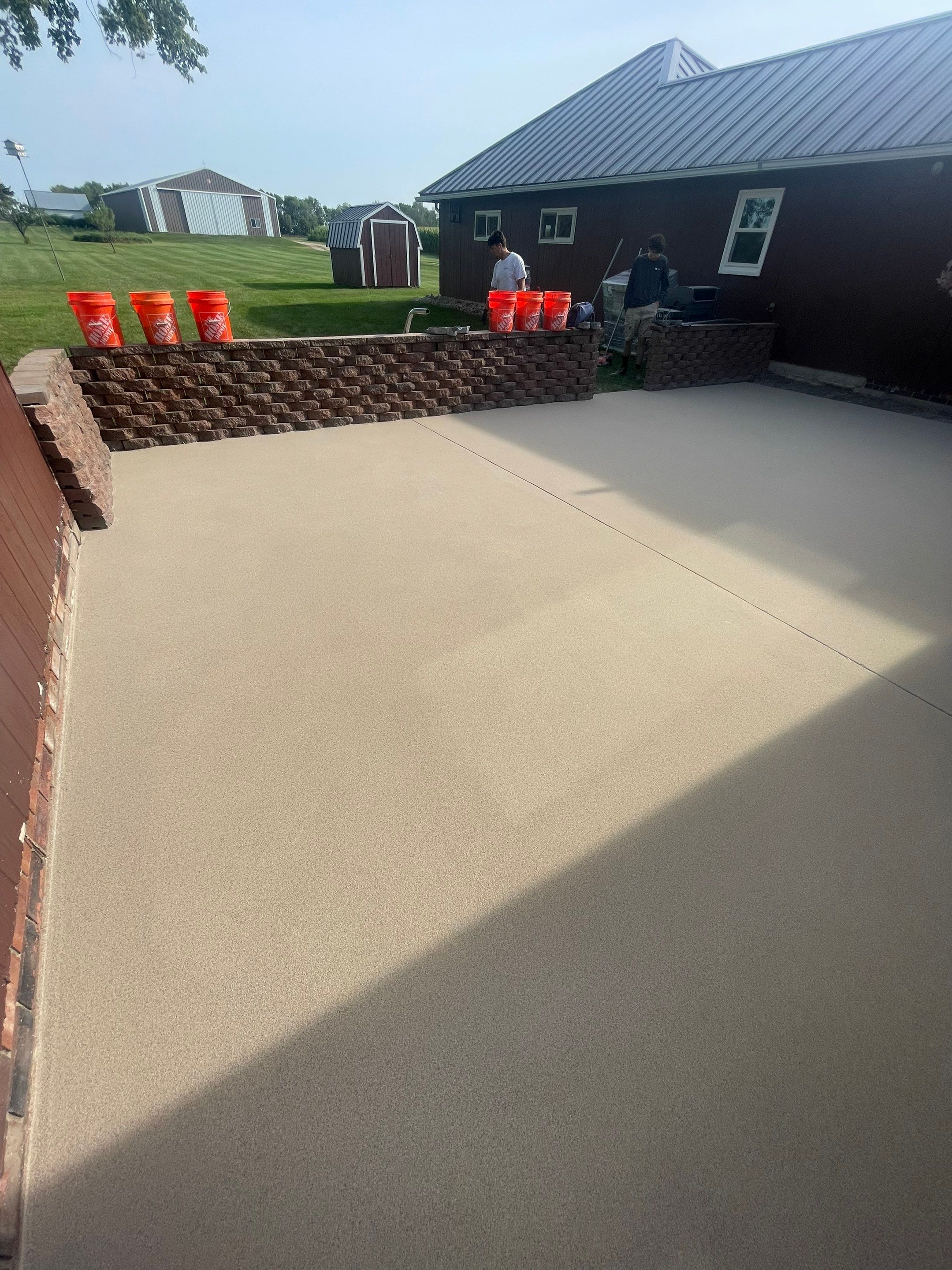 Concrete Patio Resurfacing and Protective Coating in Winfred, South Dakota by Select Painting, Coatings & Garage Cabinets